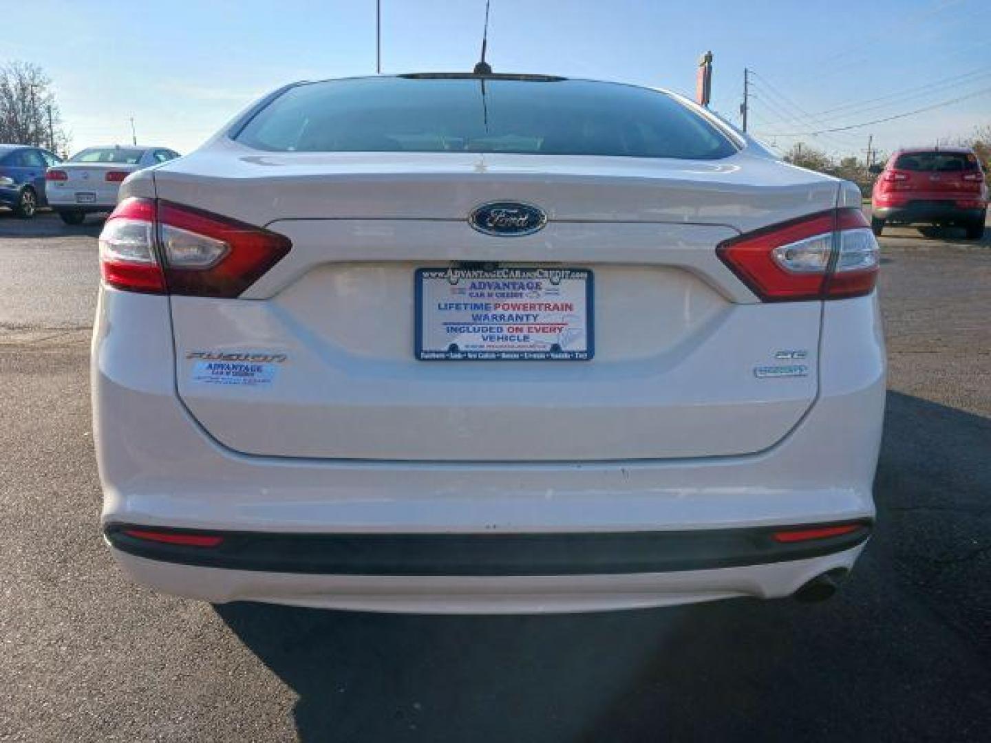 2015 White Platinum Met TC Ford Fusion SE (3FA6P0HD5FR) with an 1.5L L4 DOHC 16V engine, 6-Speed Automatic transmission, located at 1099 N County Rd 25A, OH, 45373, (937) 908-9800, 40.057079, -84.212883 - Photo#5