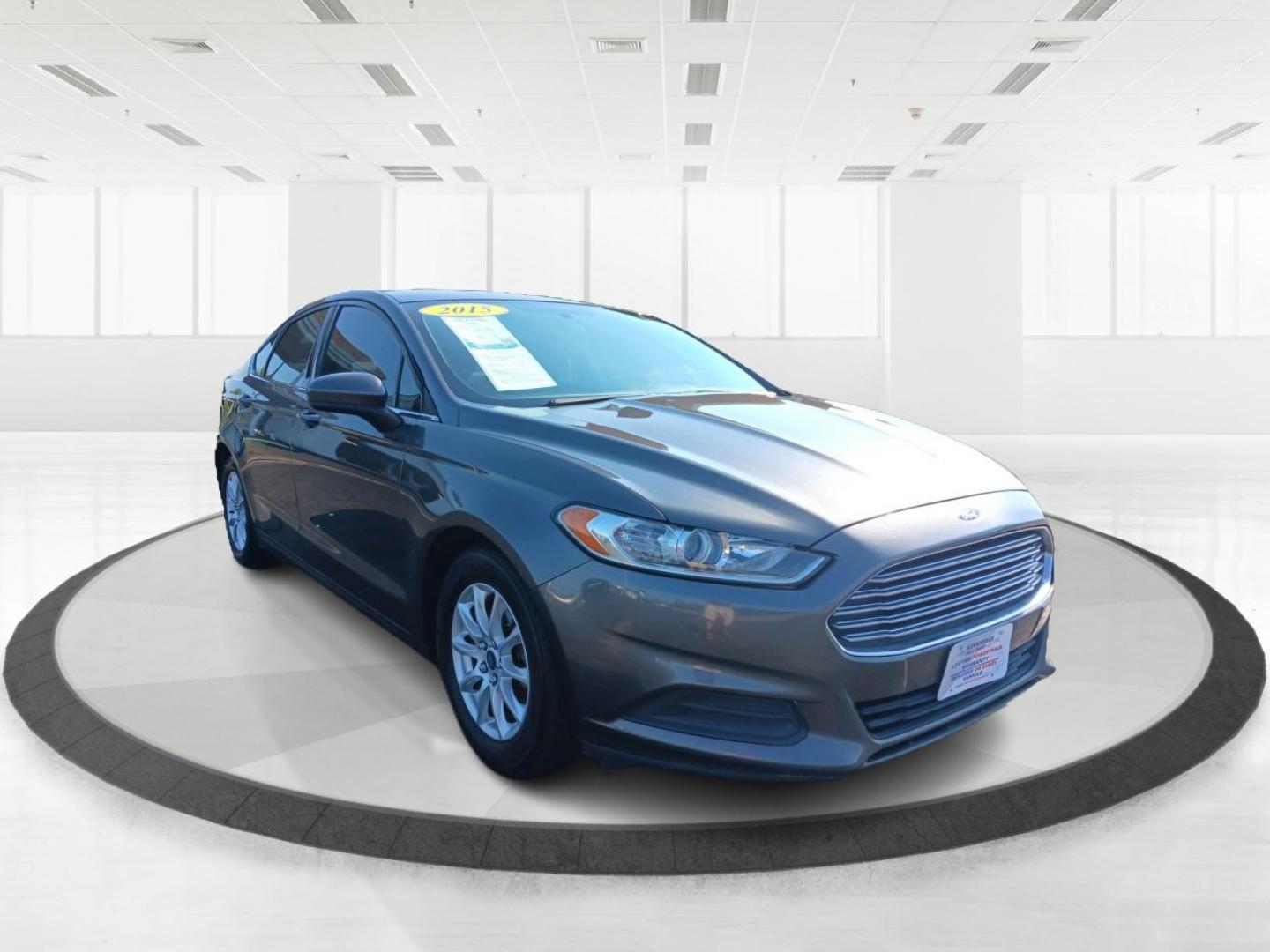 2015 Magnetic Ford Fusion (3FA6P0G78FR) with an 2.5L L4 DOHC 16V engine, 6-Speed Automatic transmission, located at 4508 South Dixie Dr, Moraine, OH, 45439, (937) 908-9800, 39.690136, -84.216438 - Photo#0