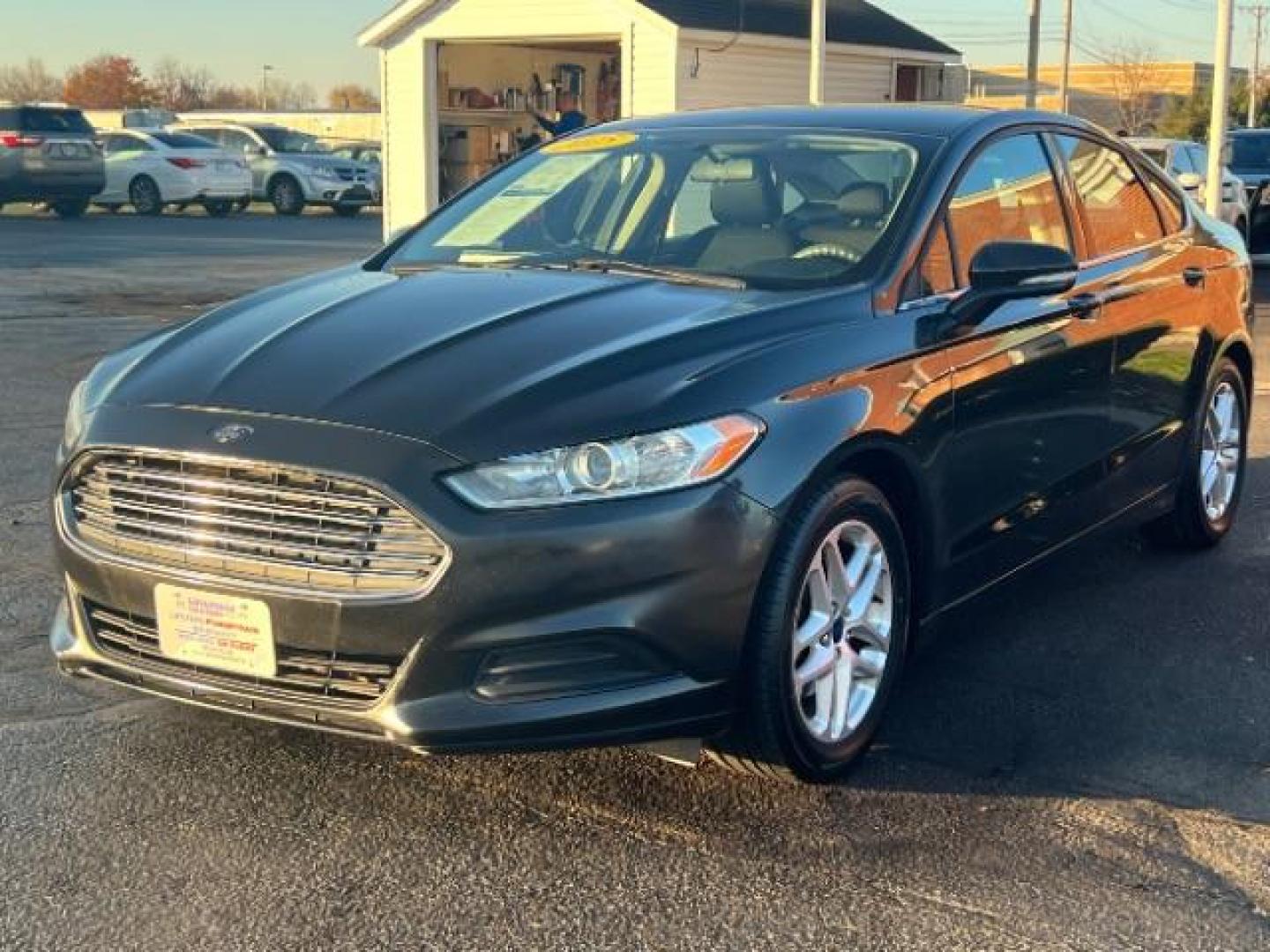 2015 Tuxedo Black Ford Fusion SE (3FA6P0H73FR) with an 2.5L L4 DOHC 16V engine, 6-Speed Automatic transmission, located at 1230 East Main St, Xenia, OH, 45385, (937) 908-9800, 39.687321, -83.910294 - Photo#2