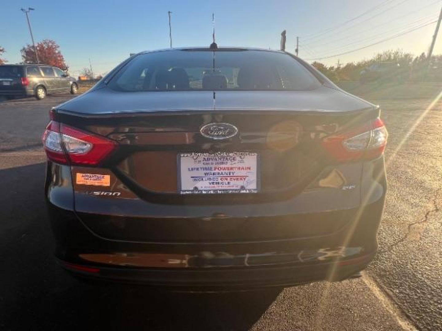 2015 Tuxedo Black Ford Fusion SE (3FA6P0H73FR) with an 2.5L L4 DOHC 16V engine, 6-Speed Automatic transmission, located at 1230 East Main St, Xenia, OH, 45385, (937) 908-9800, 39.687321, -83.910294 - Photo#4