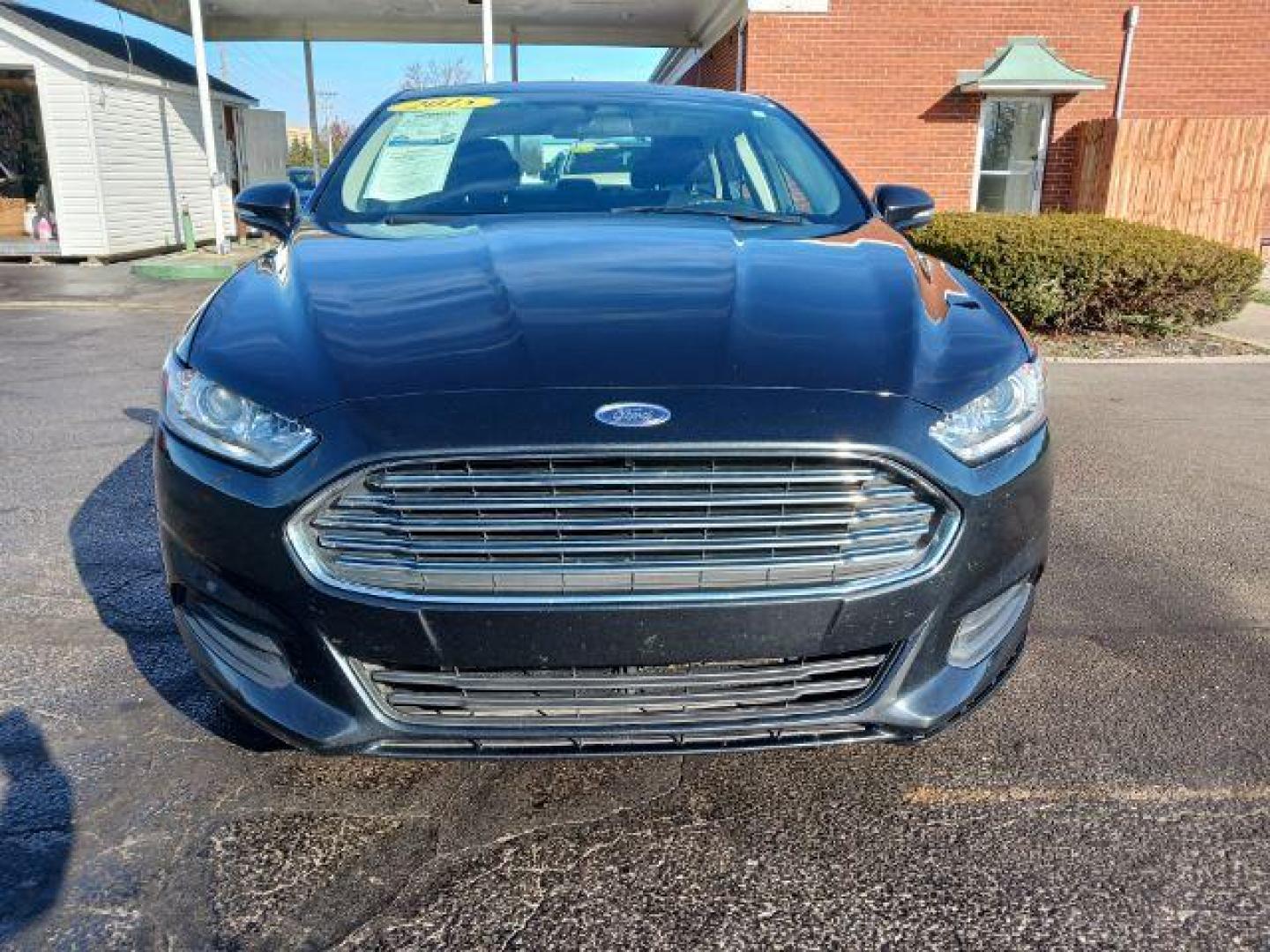 2015 Tuxedo Black Ford Fusion SE (3FA6P0H7XFR) with an 2.5L L4 DOHC 16V engine, 6-Speed Automatic transmission, located at 1230 East Main St, Xenia, OH, 45385, (937) 908-9800, 39.687321, -83.910294 - Photo#1