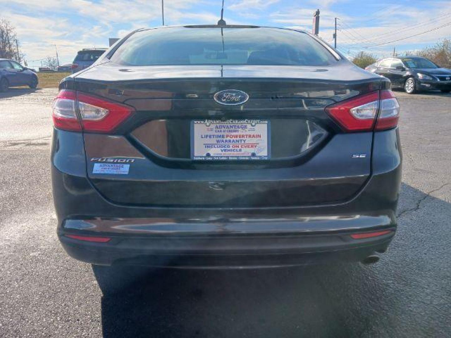 2015 Tuxedo Black Ford Fusion SE (3FA6P0H7XFR) with an 2.5L L4 DOHC 16V engine, 6-Speed Automatic transmission, located at 1230 East Main St, Xenia, OH, 45385, (937) 908-9800, 39.687321, -83.910294 - Photo#5