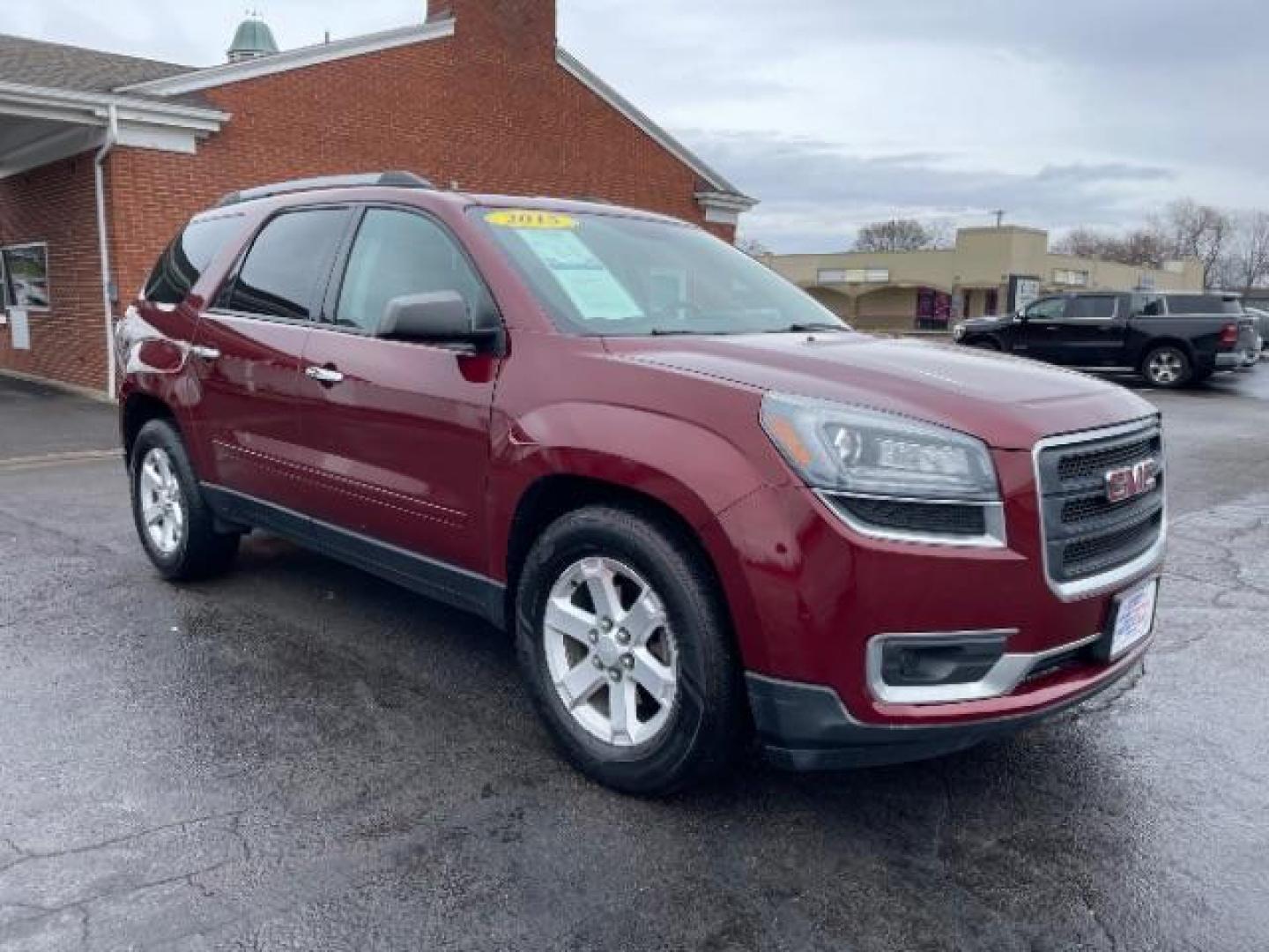 2015 Crimson Red Tincoat GMC Acadia SLE-2 AWD (1GKKVPKDXFJ) with an 3.6L V6 DOHC 24V engine, 6-Speed Automatic transmission, located at 1184 Kauffman Ave, Fairborn, OH, 45324, (937) 908-9800, 39.807365, -84.029114 - Photo#0