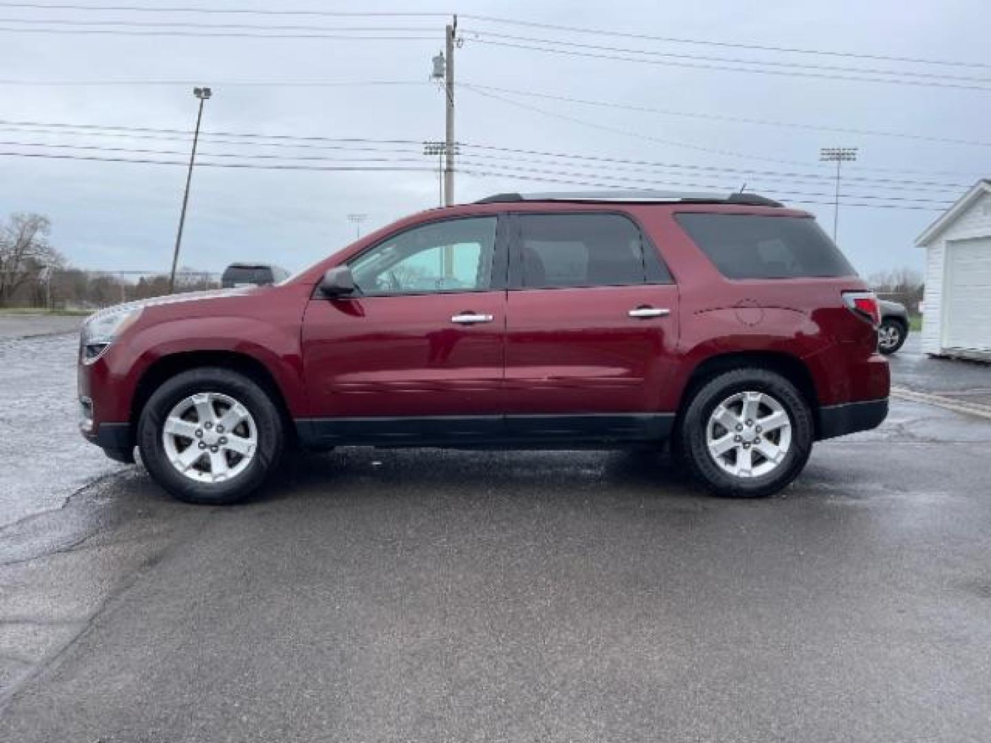 2015 Crimson Red Tincoat GMC Acadia SLE-2 AWD (1GKKVPKDXFJ) with an 3.6L V6 DOHC 24V engine, 6-Speed Automatic transmission, located at 1184 Kauffman Ave, Fairborn, OH, 45324, (937) 908-9800, 39.807365, -84.029114 - Photo#2