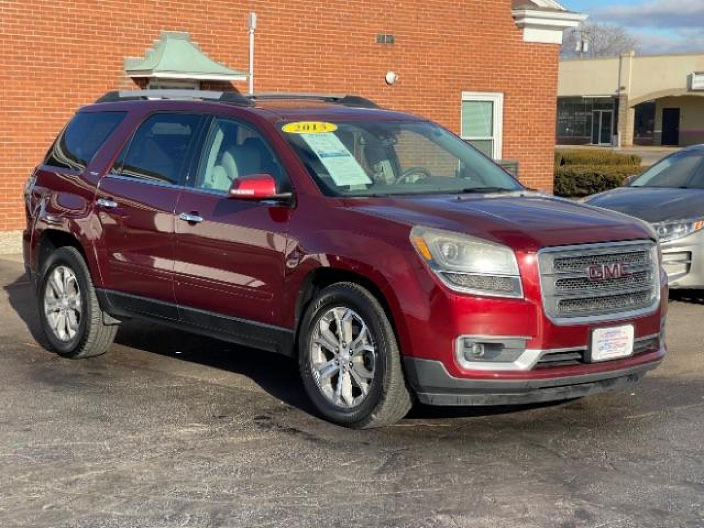 2015 Crimson Red Tincoat GMC Acadia SLT-1 FWD (1GKKRRKD7FJ) with an 3.6L V6 DOHC 24V engine, 6-Speed Automatic transmission, located at 880 E. National Road, Vandalia, OH, 45377, (937) 908-9800, 39.892189, -84.181015 - Photo#0