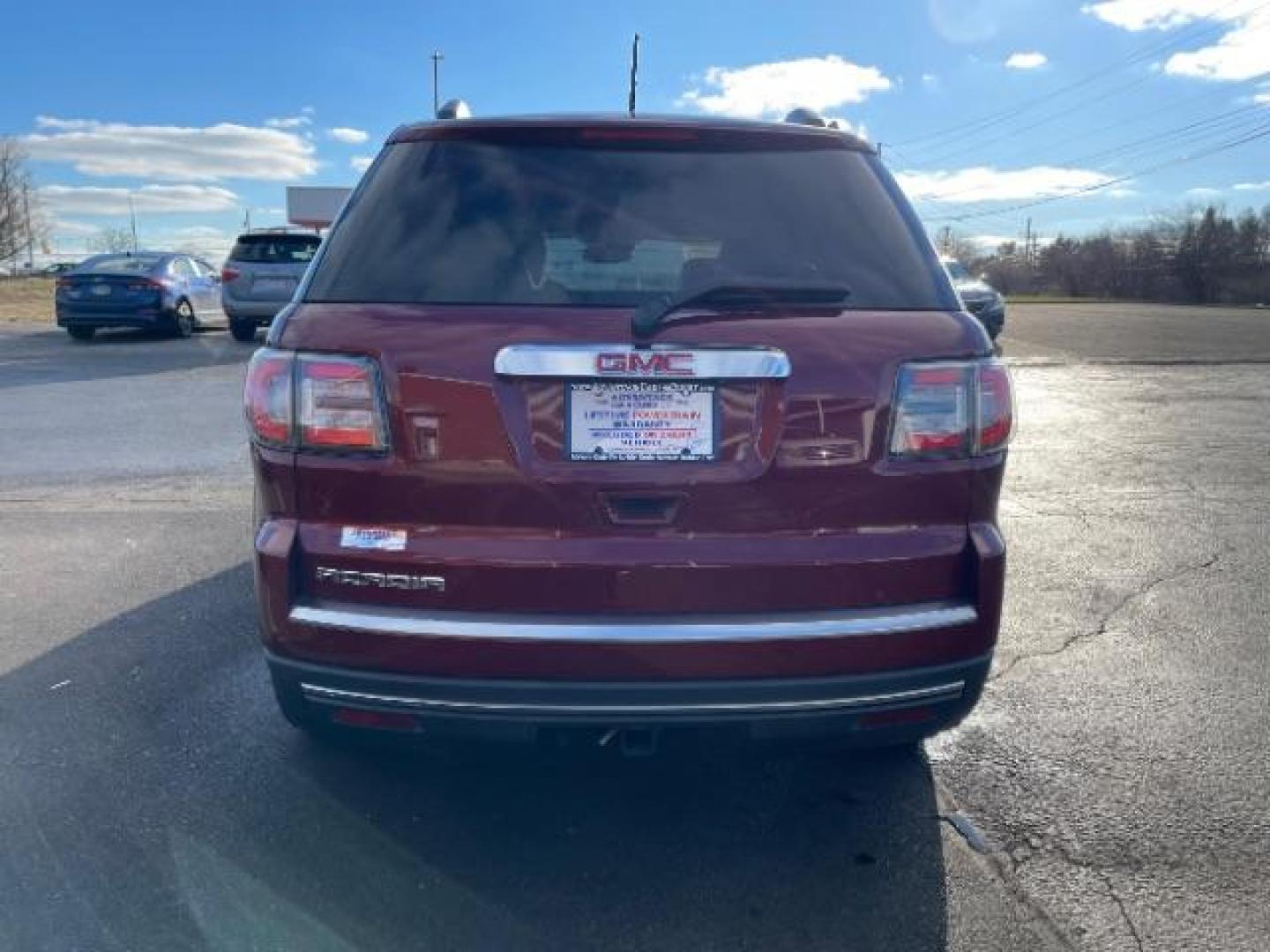 2015 Crimson Red Tincoat GMC Acadia SLT-1 FWD (1GKKRRKD7FJ) with an 3.6L V6 DOHC 24V engine, 6-Speed Automatic transmission, located at 880 E. National Road, Vandalia, OH, 45377, (937) 908-9800, 39.892189, -84.181015 - Photo#3