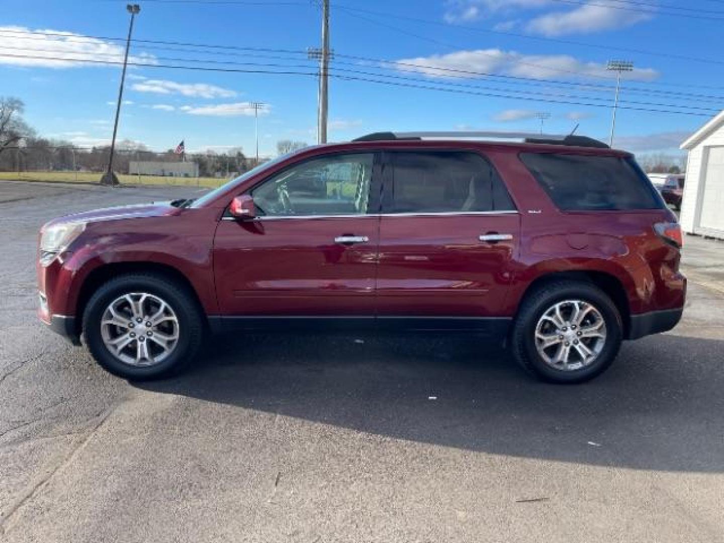 2015 Crimson Red Tincoat GMC Acadia SLT-1 FWD (1GKKRRKD7FJ) with an 3.6L V6 DOHC 24V engine, 6-Speed Automatic transmission, located at 880 E. National Road, Vandalia, OH, 45377, (937) 908-9800, 39.892189, -84.181015 - Photo#5