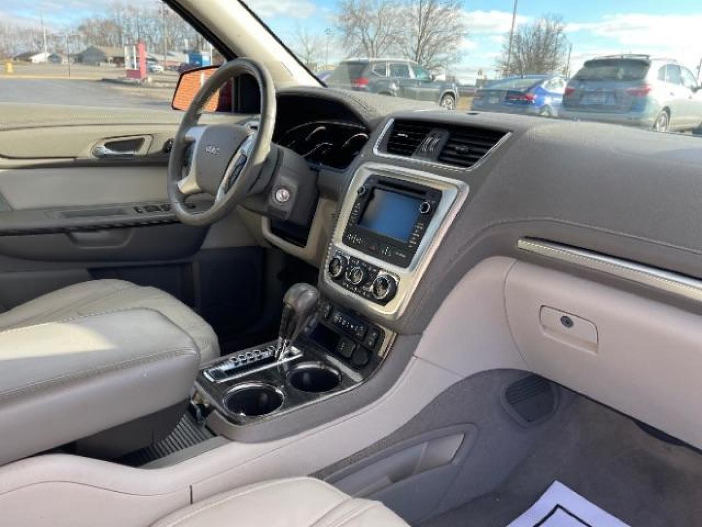 2015 Crimson Red Tincoat GMC Acadia SLT-1 FWD (1GKKRRKD7FJ) with an 3.6L V6 DOHC 24V engine, 6-Speed Automatic transmission, located at 880 E. National Road, Vandalia, OH, 45377, (937) 908-9800, 39.892189, -84.181015 - Photo#8