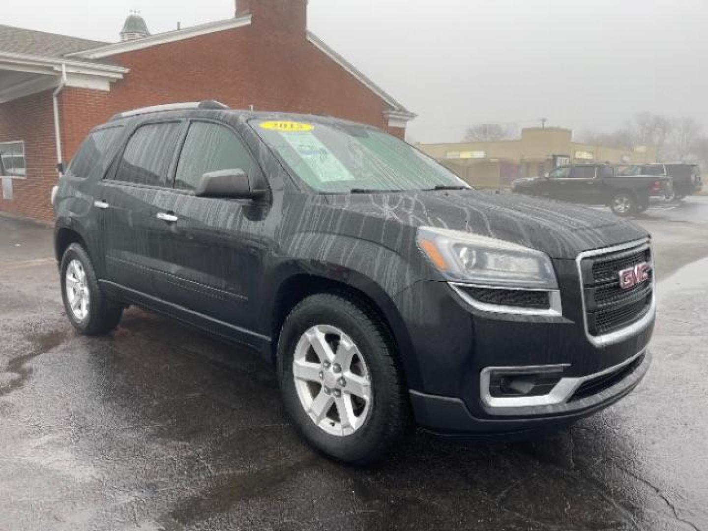 2015 Carbon Black Metallic GMC Acadia SLE-2 FWD (1GKKRPKD3FJ) with an 3.6L V6 DOHC 24V engine, 6-Speed Automatic transmission, located at 1184 Kauffman Ave, Fairborn, OH, 45324, (937) 908-9800, 39.807365, -84.029114 - Photo#0