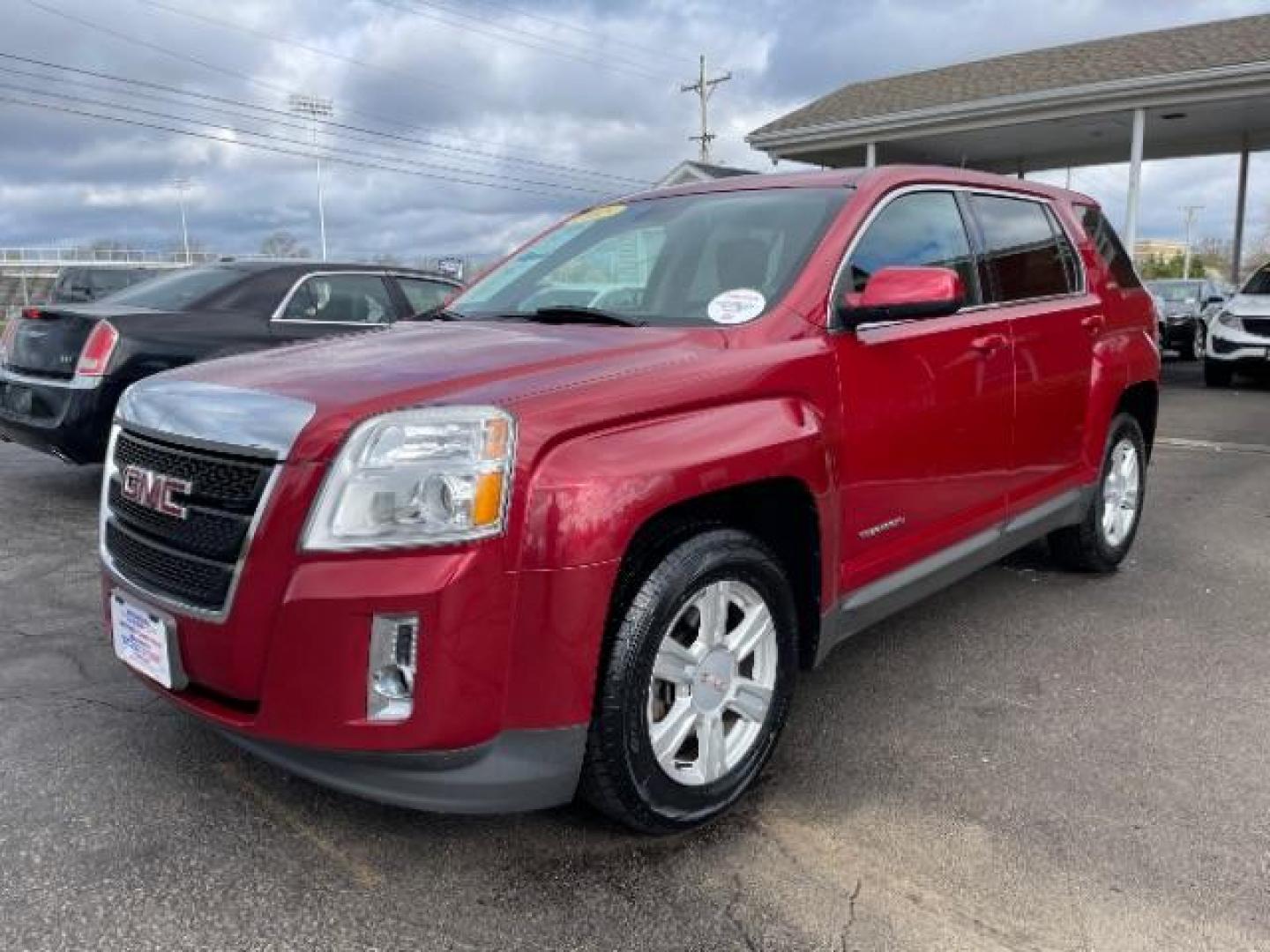 2015 Crystal Red Tintcoat GMC Terrain SLE1 FWD (2GKALMEK6F6) with an 2.4L L4 DOHC 16V engine, 6-Speed Automatic transmission, located at 880 E. National Road, Vandalia, OH, 45377, (937) 908-9800, 39.892189, -84.181015 - Photo#1