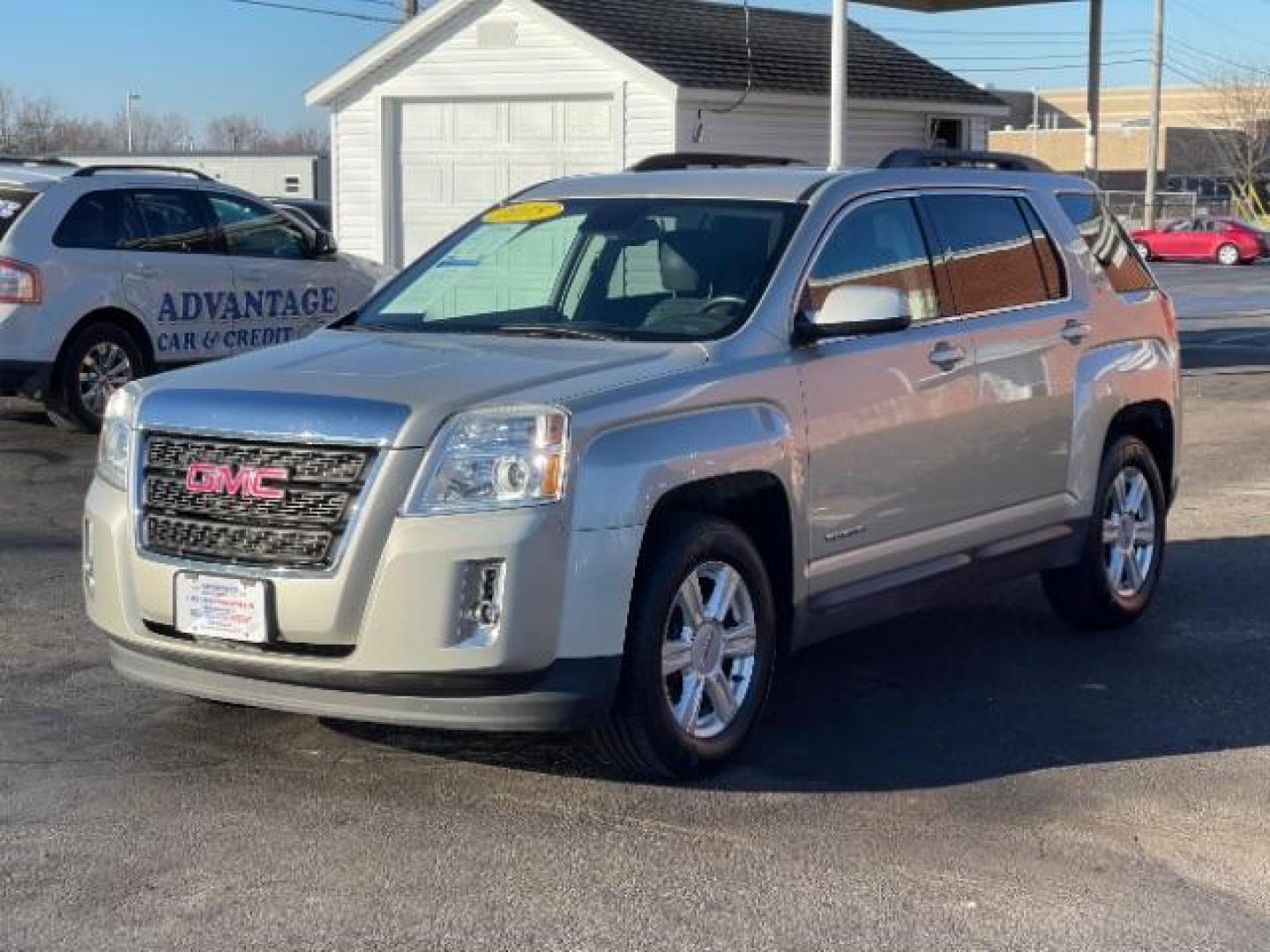 2015 Champagne Silver Metallic GMC Terrain SLE2 FWD (2GKALREK9F6) with an 2.4L L4 DOHC 16V engine, 6-Speed Automatic transmission, located at 1099 N County Rd 25A, OH, 45373, (937) 908-9800, 40.057079, -84.212883 - Photo#1