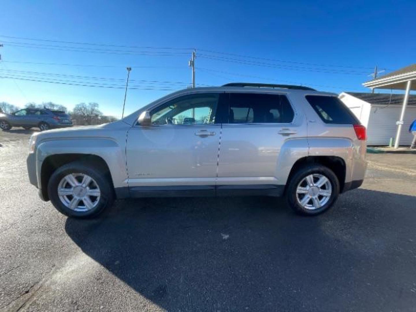 2015 Champagne Silver Metallic GMC Terrain SLE2 FWD (2GKALREK9F6) with an 2.4L L4 DOHC 16V engine, 6-Speed Automatic transmission, located at 1099 N County Rd 25A, OH, 45373, (937) 908-9800, 40.057079, -84.212883 - Photo#2