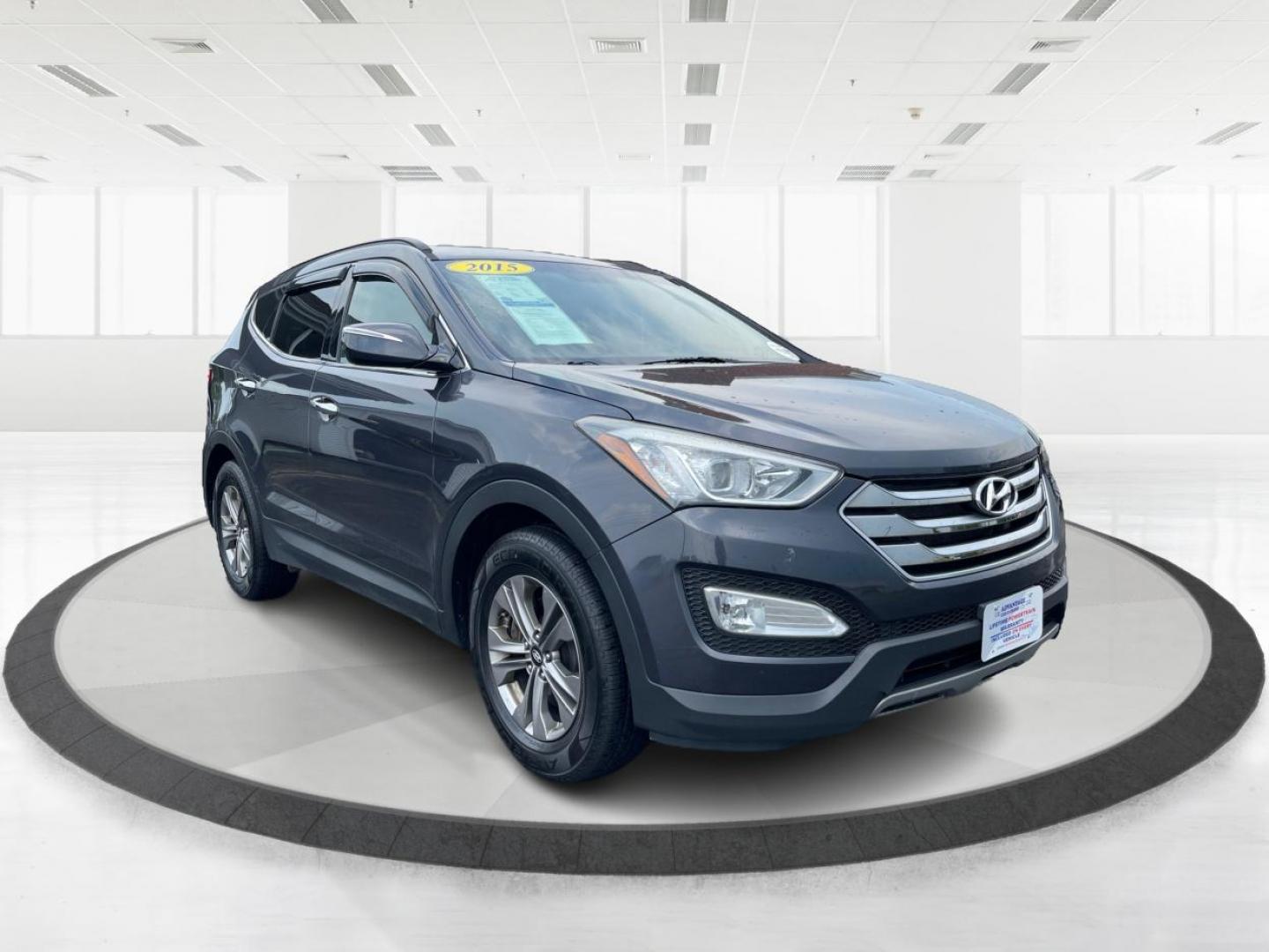 2015 Mineral Gray Hyundai Santa Fe (5XYZUDLB8FG) with an 2.4L L4 DOHC 16V engine, 6-Speed Automatic transmission, located at 4508 South Dixie Dr, Moraine, OH, 45439, (937) 908-9800, 39.690136, -84.216438 - Photo#0