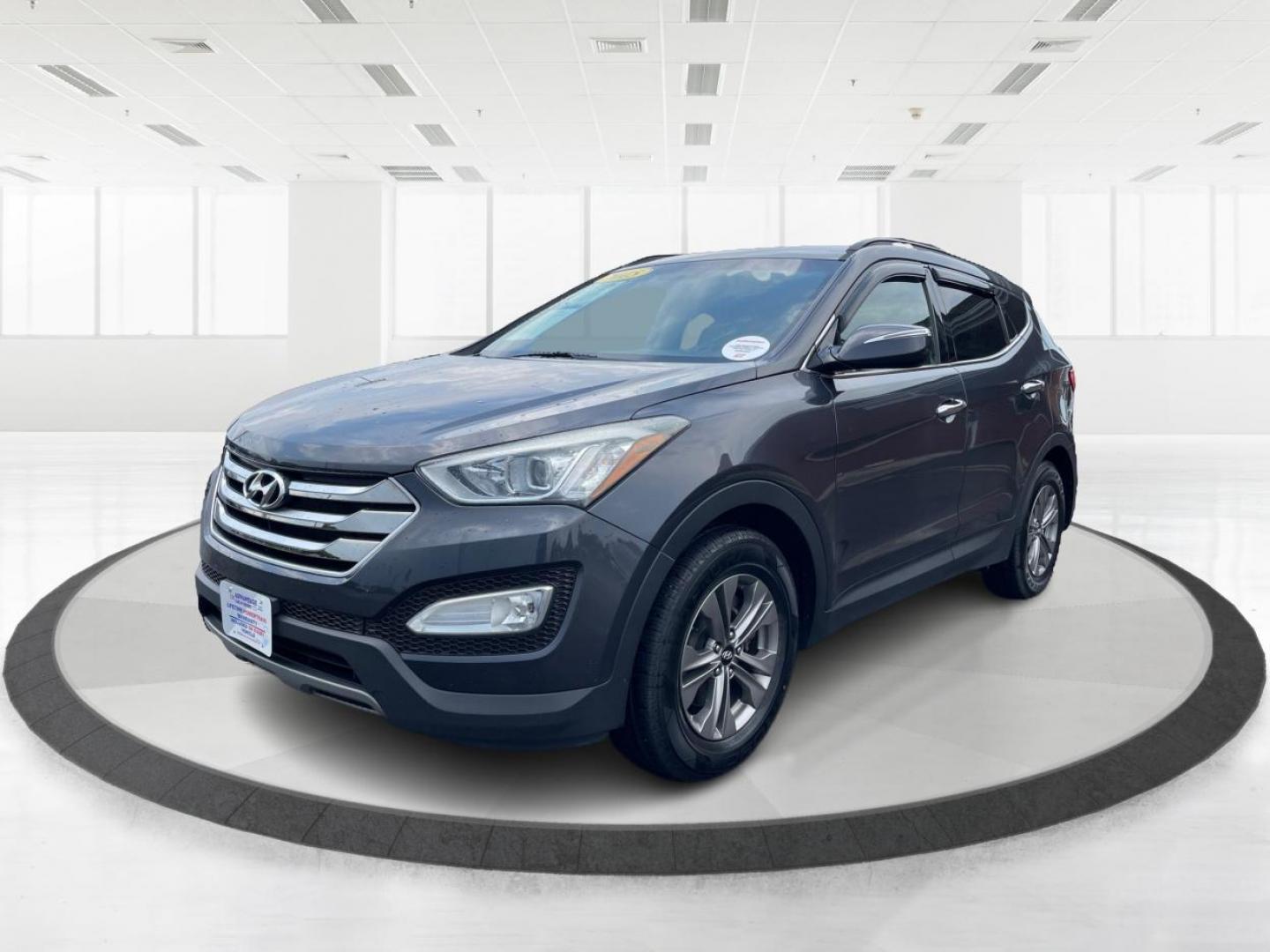 2015 Mineral Gray Hyundai Santa Fe (5XYZUDLB8FG) with an 2.4L L4 DOHC 16V engine, 6-Speed Automatic transmission, located at 4508 South Dixie Dr, Moraine, OH, 45439, (937) 908-9800, 39.690136, -84.216438 - Photo#7