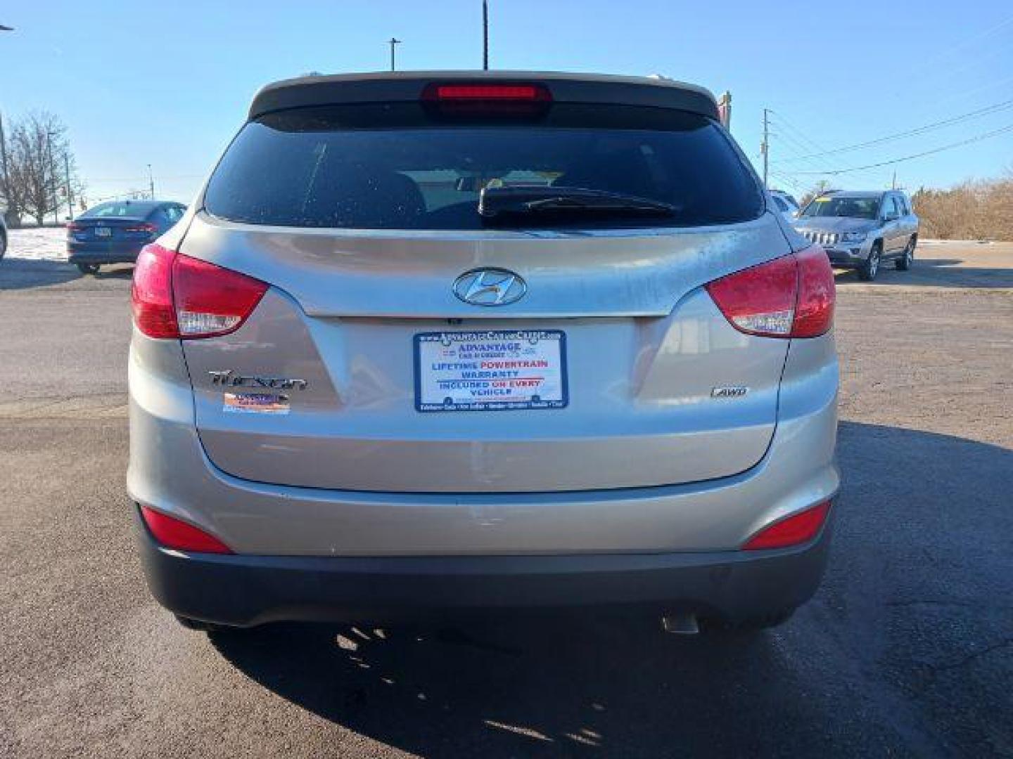 2015 Graphite Gray Metallic Hyundai Tucson SE AWD (KM8JUCAG6FU) with an 2.4L L4 DOHC 16V engine, 6-Speed Automatic transmission, located at 401 Woodman Dr, Riverside, OH, 45431, (937) 908-9800, 39.763779, -84.122063 - Photo#5