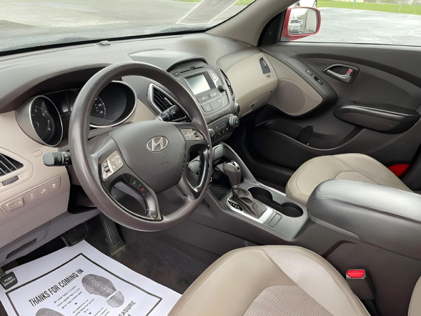 2015 Garnet Red Mica Hyundai Tucson SE AWD (KM8JTCAF6FU) with an 2.0L L4 DOHC 16V engine, 6-Speed Automatic transmission, located at 1230 East Main St, Xenia, OH, 45385, (937) 908-9800, 39.687321, -83.910294 - Photo#6