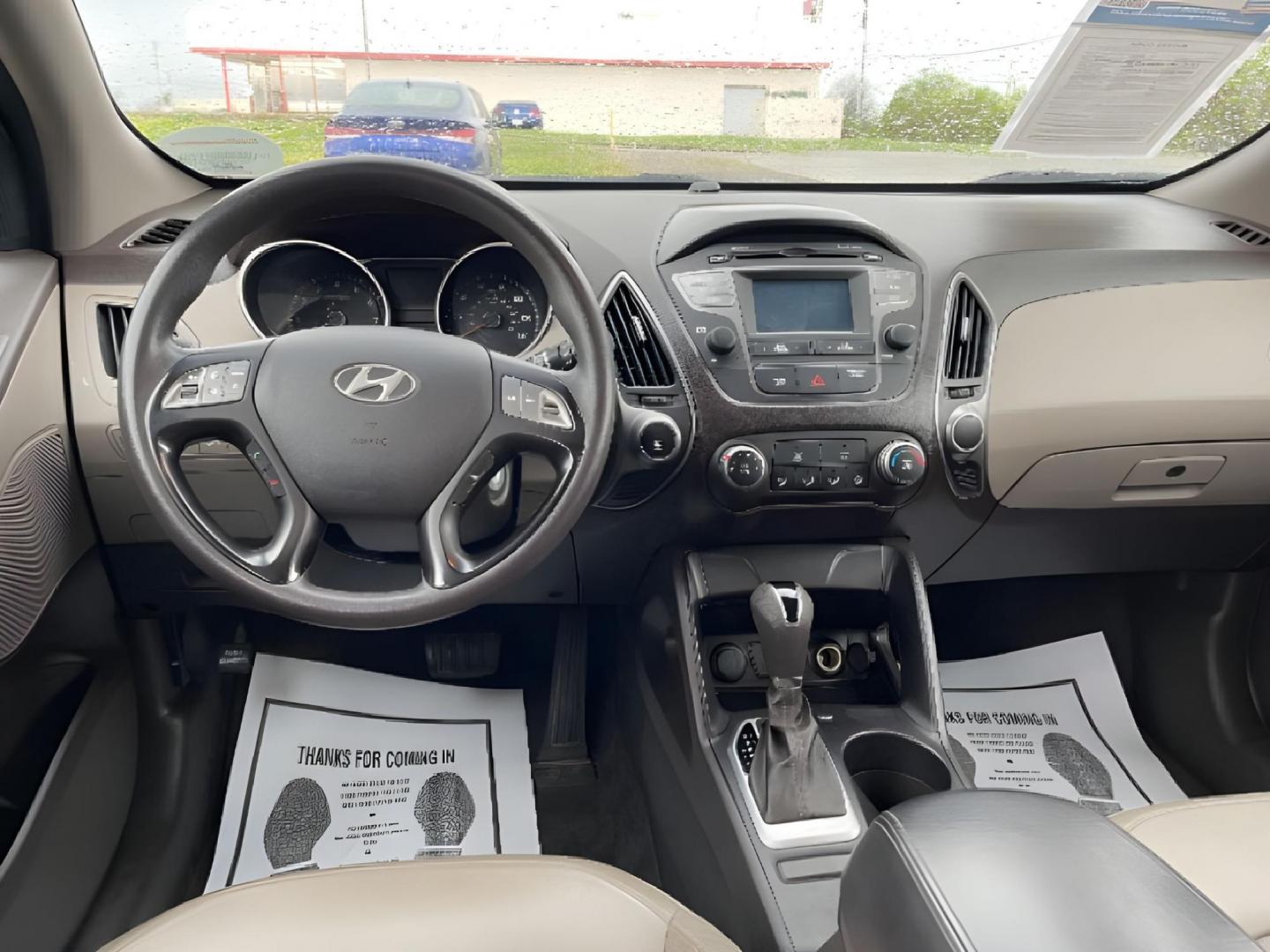 2015 Garnet Red Mica Hyundai Tucson SE AWD (KM8JTCAF6FU) with an 2.0L L4 DOHC 16V engine, 6-Speed Automatic transmission, located at 1230 East Main St, Xenia, OH, 45385, (937) 908-9800, 39.687321, -83.910294 - Photo#7