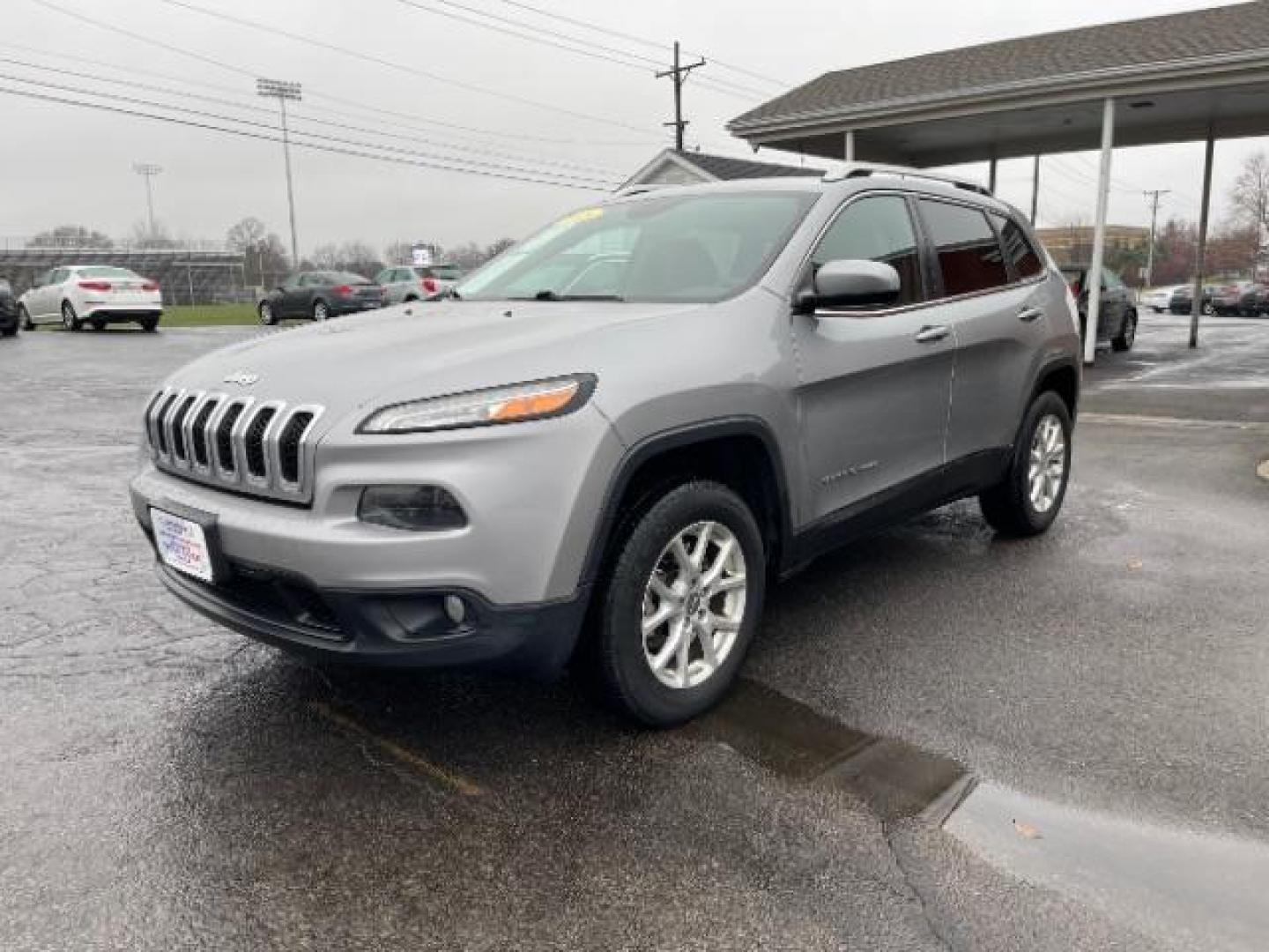 2015 Billet Silver Metallic CC Jeep Cherokee Latitude 4WD (1C4PJMCBXFW) with an 2.4L L4 DOHC 16V engine, 9-Speed Automatic transmission, located at 1184 Kauffman Ave, Fairborn, OH, 45324, (937) 908-9800, 39.807365, -84.029114 - Photo#1