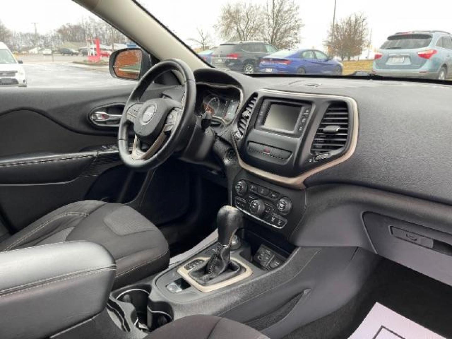 2015 Billet Silver Metallic CC Jeep Cherokee Latitude 4WD (1C4PJMCBXFW) with an 2.4L L4 DOHC 16V engine, 9-Speed Automatic transmission, located at 1184 Kauffman Ave, Fairborn, OH, 45324, (937) 908-9800, 39.807365, -84.029114 - Photo#7