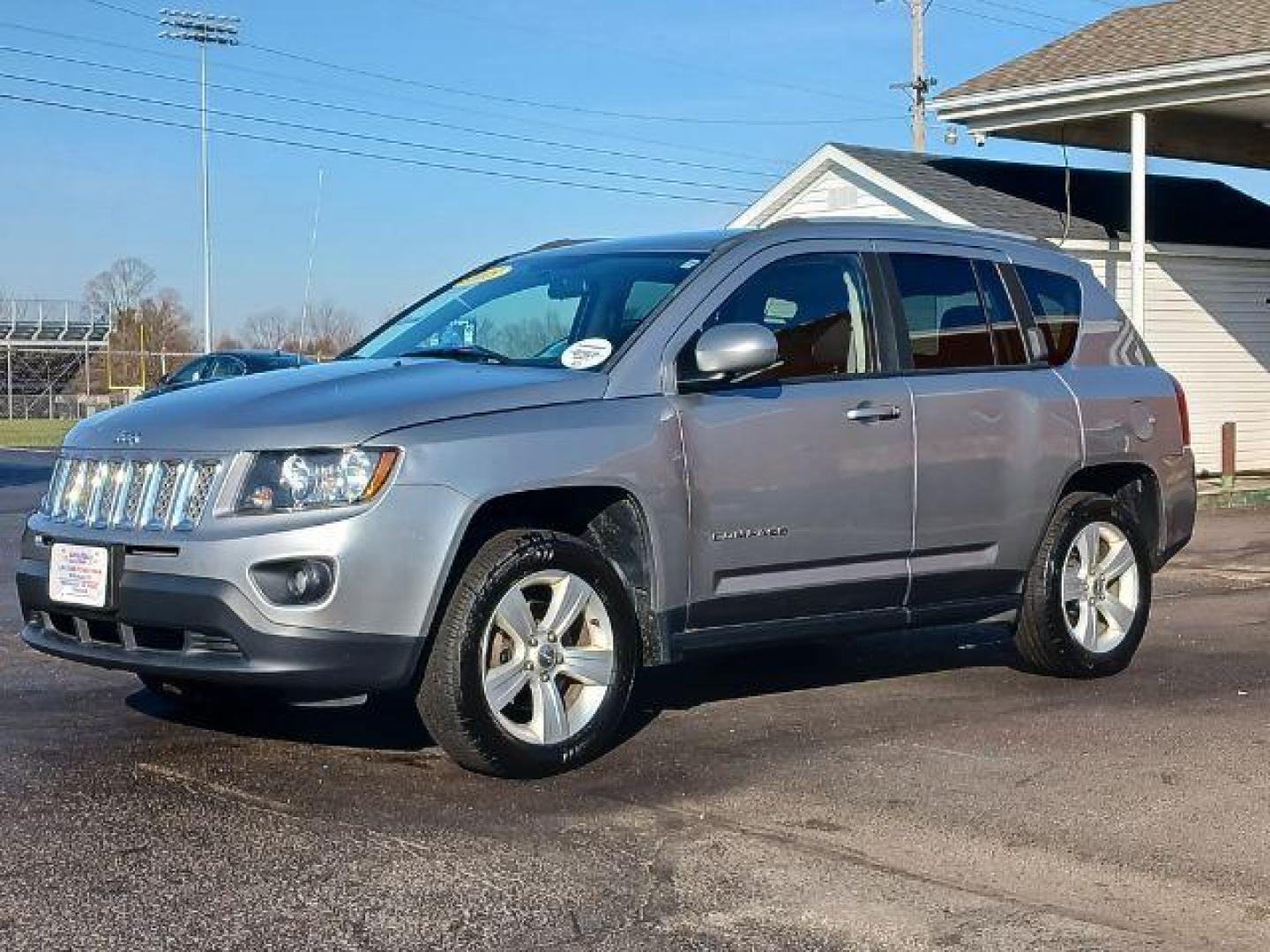 2015 Billet Silver Metallic Clear Coat Jeep Compass Latitude 4WD (1C4NJDEB0FD) with an 2.4L L4 DOHC 16V engine, 6-Speed Automatic transmission, located at 1951 S Dayton Lakeview Rd., New Carlisle, OH, 45344, (937) 908-9800, 39.890999, -84.050255 - Photo#2