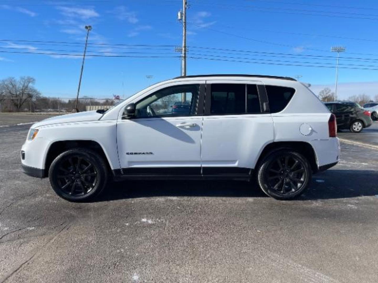 2015 Bright White Clear Coat Jeep Compass Sport 4WD (1C4NJDBB4FD) with an 2.4L L4 DOHC 16V engine, located at 1951 S Dayton Lakeview Rd., New Carlisle, OH, 45344, (937) 908-9800, 39.890999, -84.050255 - Photo#2