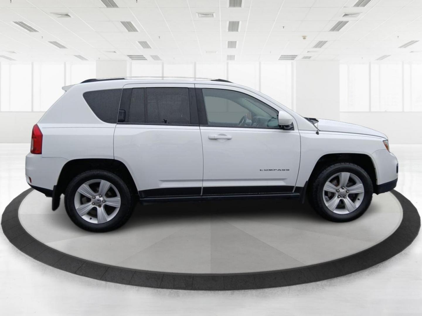 2015 Jeep Compass Latitude 4WD (1C4NJDEB2FD) with an 2.4L L4 DOHC 16V engine, 6-Speed Automatic transmission, located at 4508 South Dixie Dr, Moraine, OH, 45439, (937) 908-9800, 39.689976, -84.218452 - 2015 Jeep Compass Latitude 4WD - Photo#1