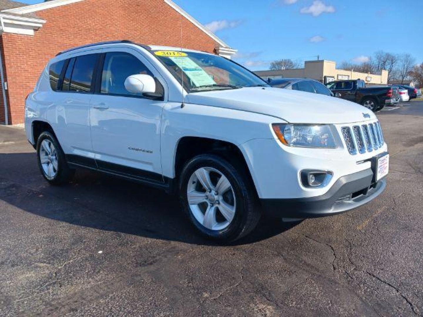 2015 Bright White Clear Coat Jeep Compass Latitude FWD (1C4NJCEA6FD) with an 2.0L L4 DOHC 16V engine, Continuously Variable Transmission transmission, located at 1099 N County Rd 25A, OH, 45373, (937) 908-9800, 40.057079, -84.212883 - Photo#0