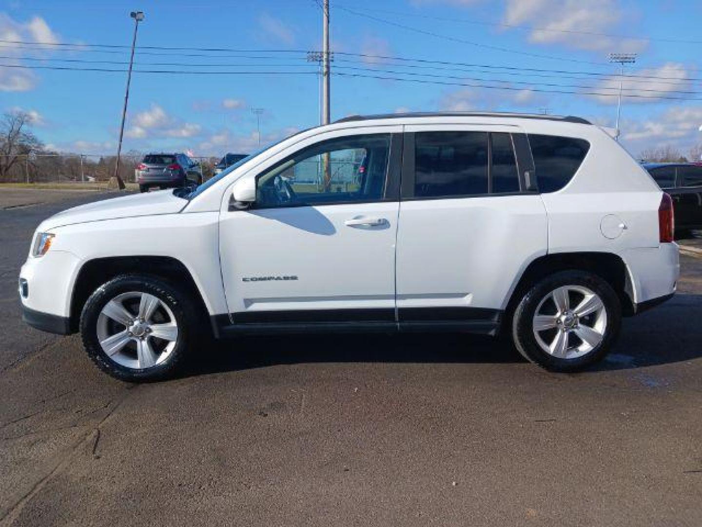 2015 Bright White Clear Coat Jeep Compass Latitude FWD (1C4NJCEA6FD) with an 2.0L L4 DOHC 16V engine, Continuously Variable Transmission transmission, located at 1099 N County Rd 25A, OH, 45373, (937) 908-9800, 40.057079, -84.212883 - Photo#3