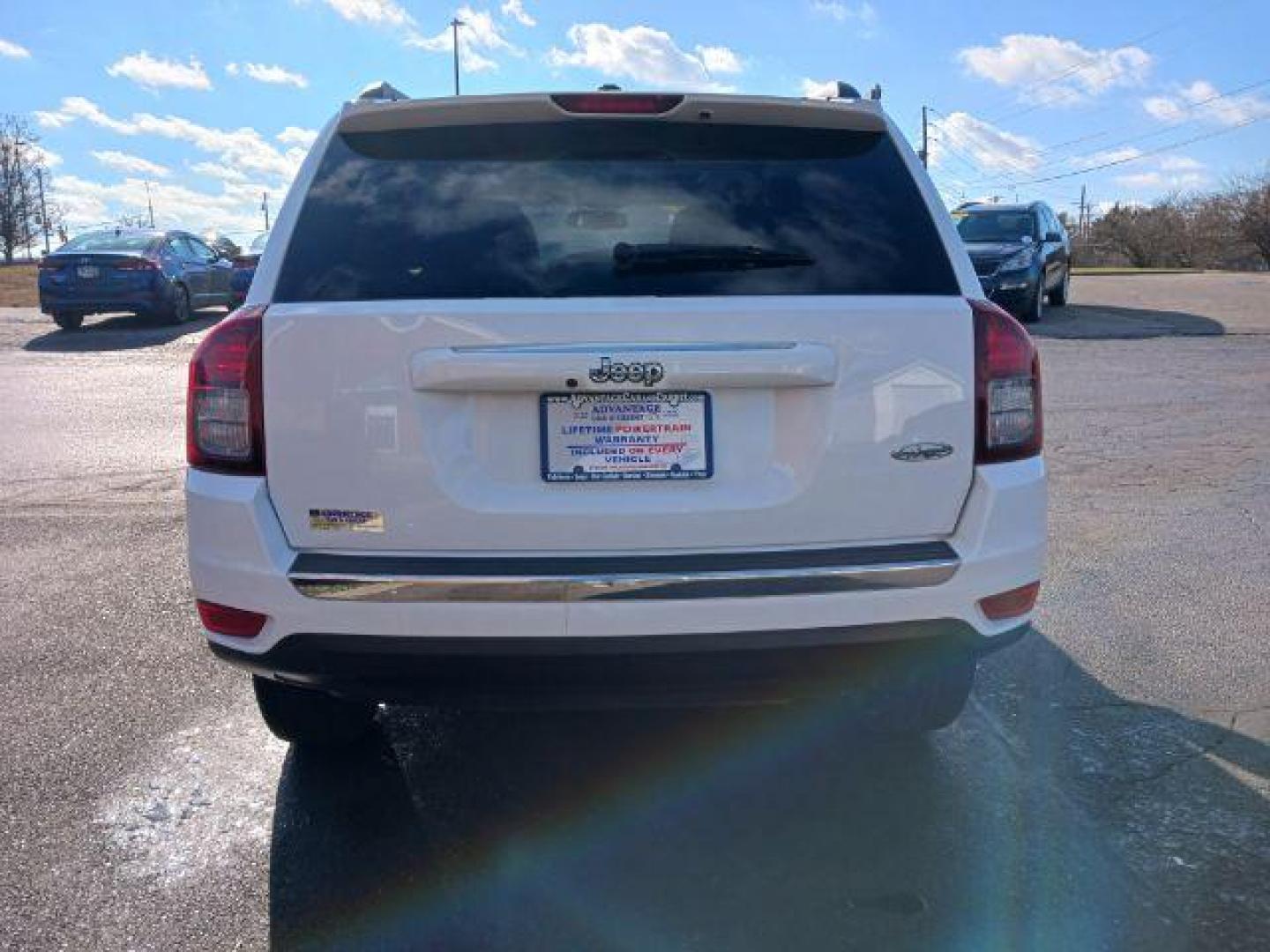 2015 Bright White Clear Coat Jeep Compass Latitude FWD (1C4NJCEA6FD) with an 2.0L L4 DOHC 16V engine, Continuously Variable Transmission transmission, located at 1099 N County Rd 25A, OH, 45373, (937) 908-9800, 40.057079, -84.212883 - Photo#5