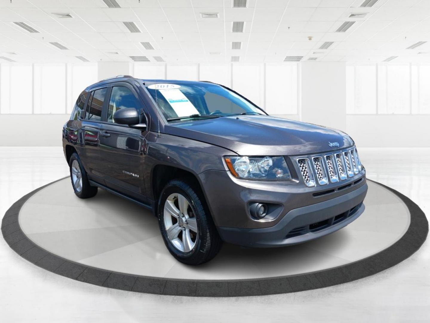 2015 Granite Crystal Metallic Clear Coat Jeep Compass (1C4NJDEB4FD) with an 2.4L L4 DOHC 16V engine, 6-Speed Automatic transmission, located at 1184 Kauffman Ave, Fairborn, OH, 45324, (937) 908-9800, 39.807365, -84.029114 - Photo#0