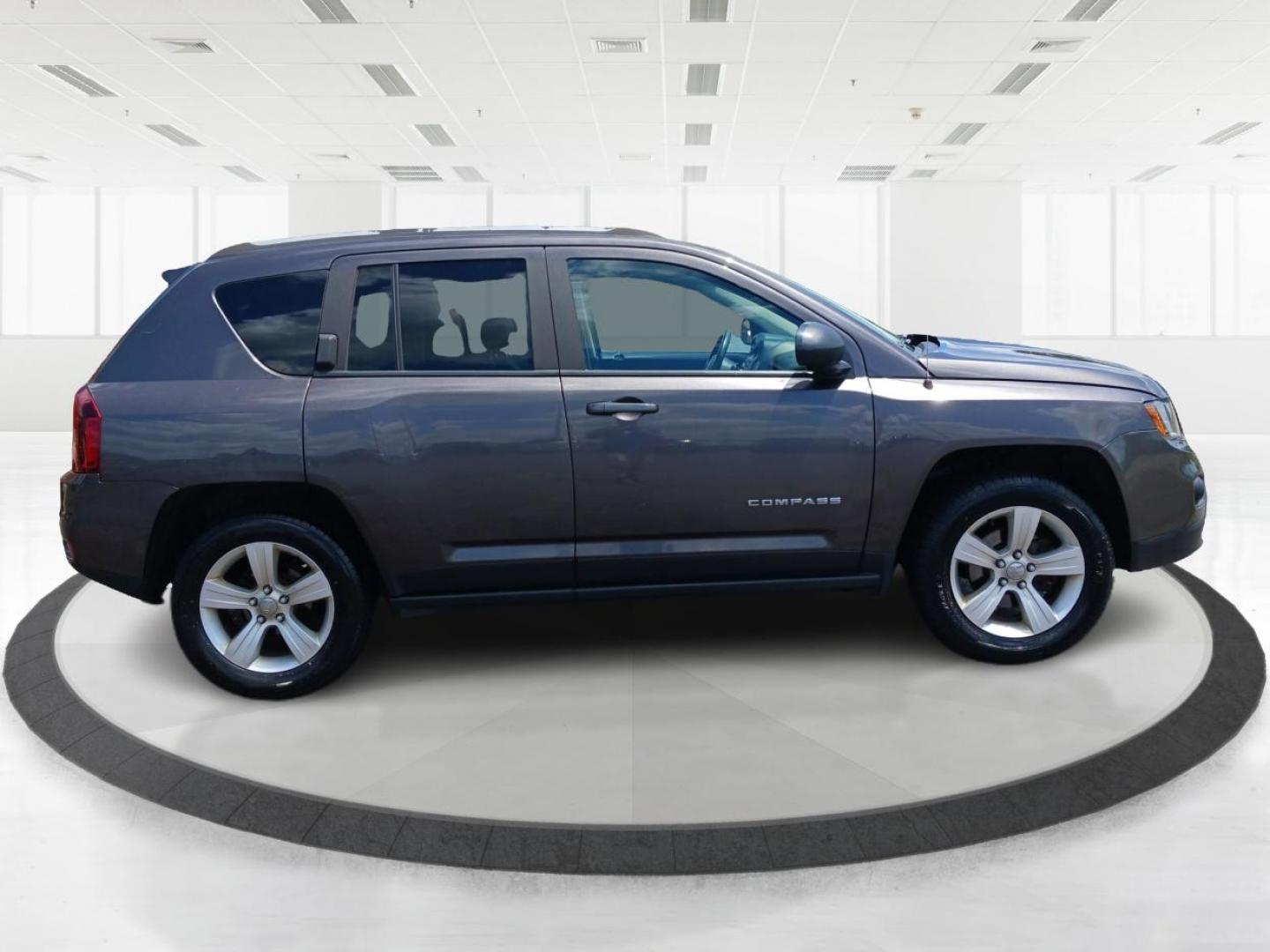 2015 Granite Crystal Metallic Clear Coat Jeep Compass (1C4NJDEB4FD) with an 2.4L L4 DOHC 16V engine, 6-Speed Automatic transmission, located at 1184 Kauffman Ave, Fairborn, OH, 45324, (937) 908-9800, 39.807365, -84.029114 - Photo#1