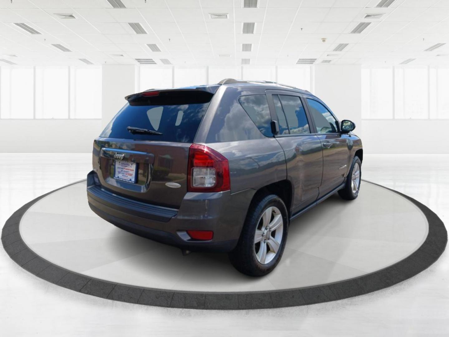 2015 Granite Crystal Metallic Clear Coat Jeep Compass (1C4NJDEB4FD) with an 2.4L L4 DOHC 16V engine, 6-Speed Automatic transmission, located at 1184 Kauffman Ave, Fairborn, OH, 45324, (937) 908-9800, 39.807365, -84.029114 - Photo#2