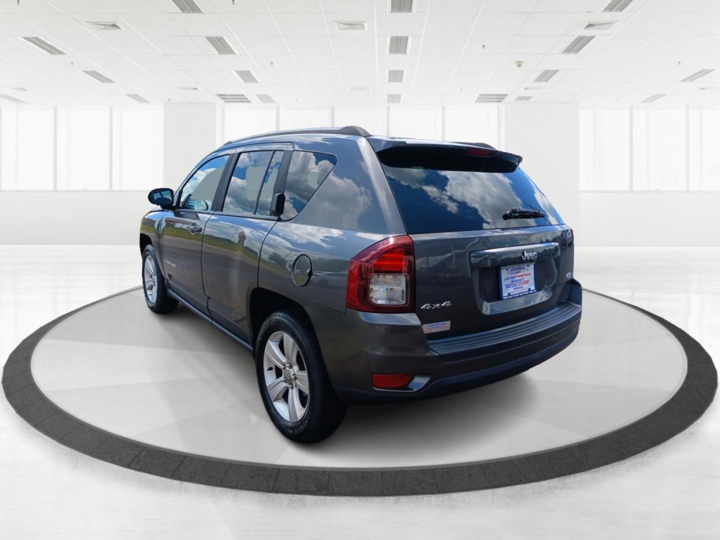 2015 Granite Crystal Metallic Clear Coat Jeep Compass (1C4NJDEB4FD) with an 2.4L L4 DOHC 16V engine, 6-Speed Automatic transmission, located at 1184 Kauffman Ave, Fairborn, OH, 45324, (937) 908-9800, 39.807365, -84.029114 - Photo#4