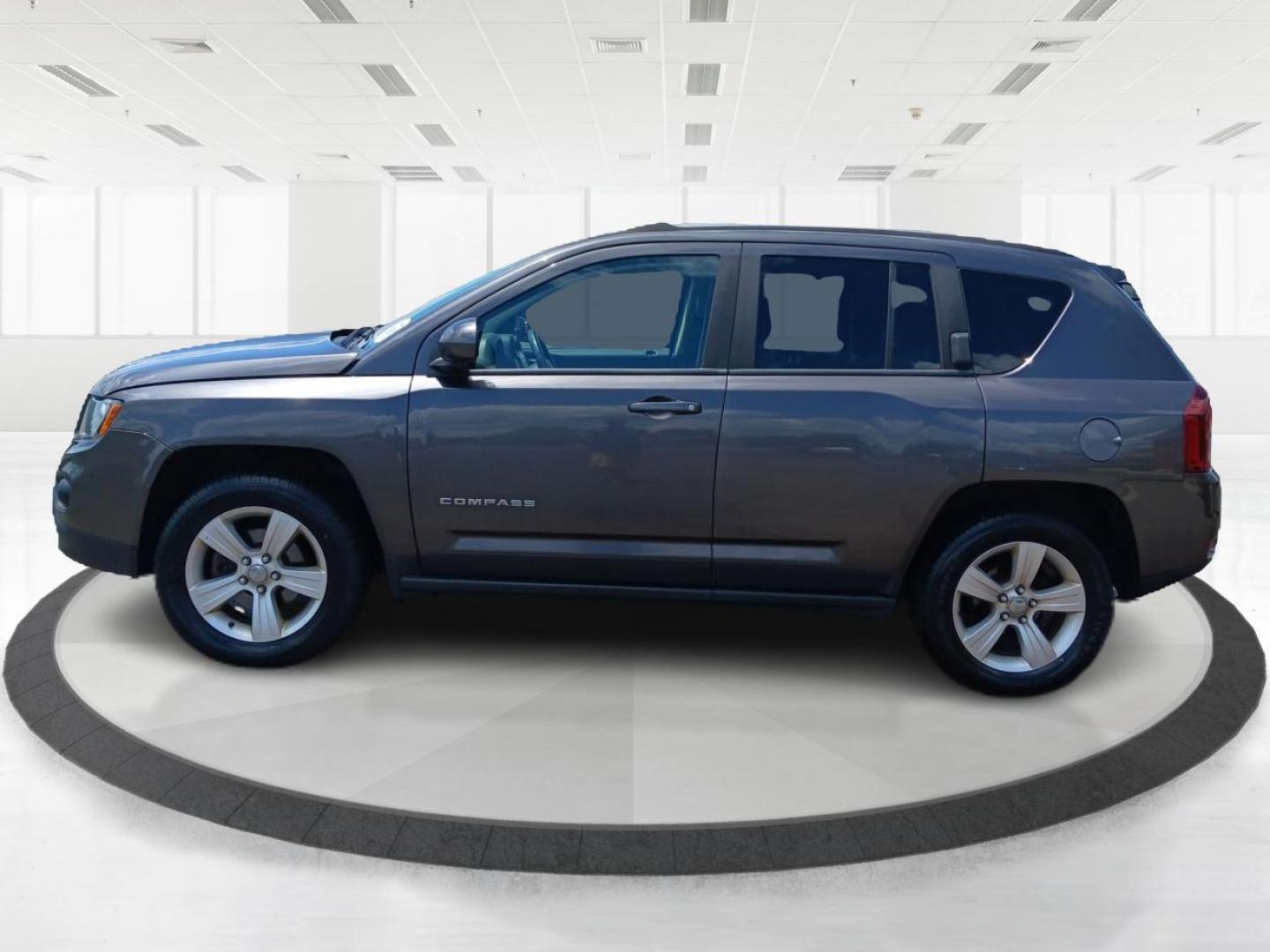 2015 Granite Crystal Metallic Clear Coat Jeep Compass (1C4NJDEB4FD) with an 2.4L L4 DOHC 16V engine, 6-Speed Automatic transmission, located at 1184 Kauffman Ave, Fairborn, OH, 45324, (937) 908-9800, 39.807365, -84.029114 - Photo#5