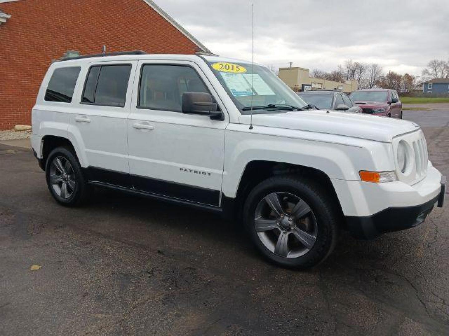 2015 Bright White Clearcoat Jeep Patriot Latitude 2WD (1C4NJPFA8FD) with an 2.0L L4 DOHC 16V engine, located at 880 E. National Road, Vandalia, OH, 45377, (937) 908-9800, 39.892189, -84.181015 - Photo#0