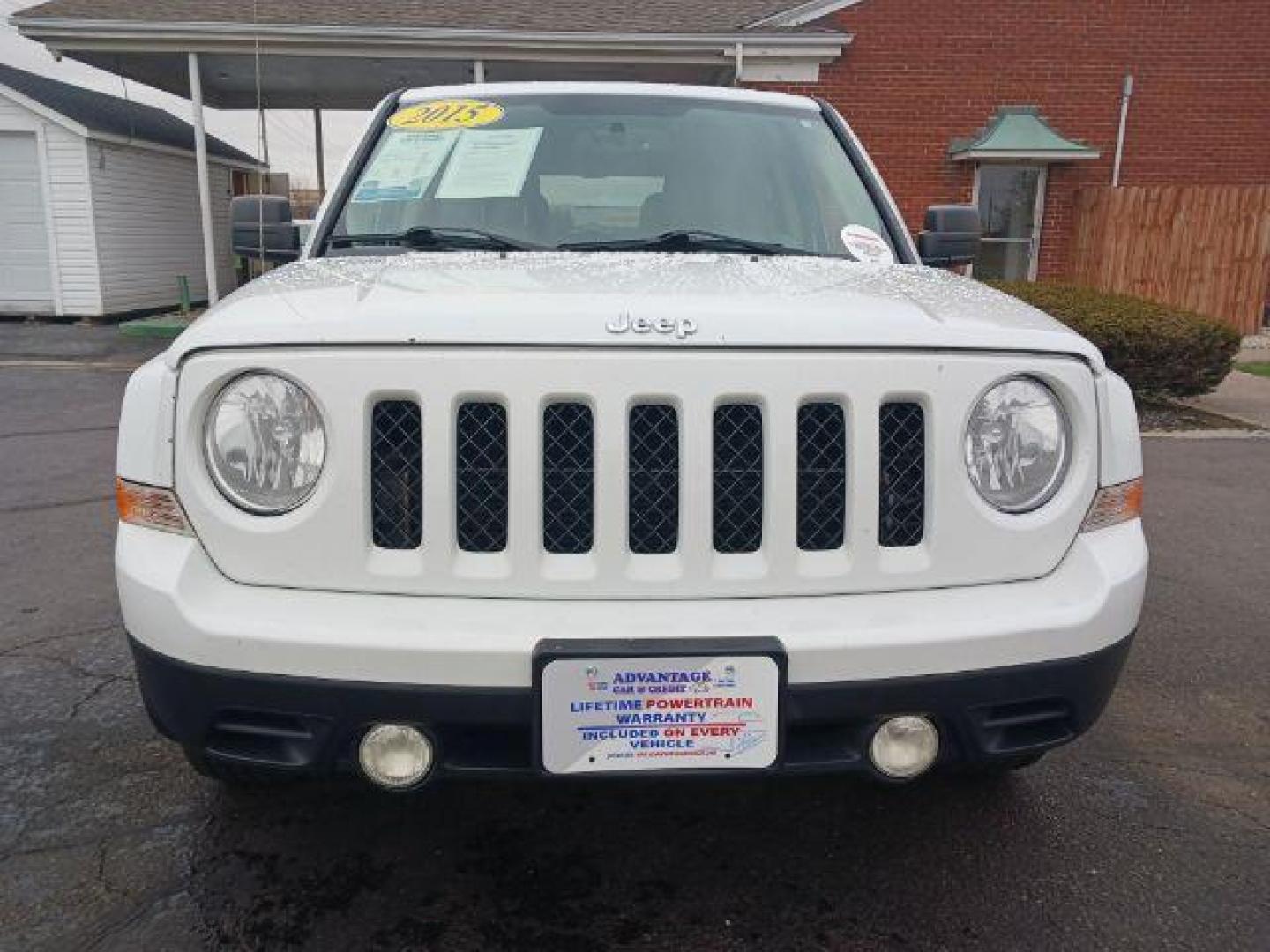 2015 Bright White Clearcoat Jeep Patriot Latitude 2WD (1C4NJPFA8FD) with an 2.0L L4 DOHC 16V engine, located at 880 E. National Road, Vandalia, OH, 45377, (937) 908-9800, 39.892189, -84.181015 - Photo#1