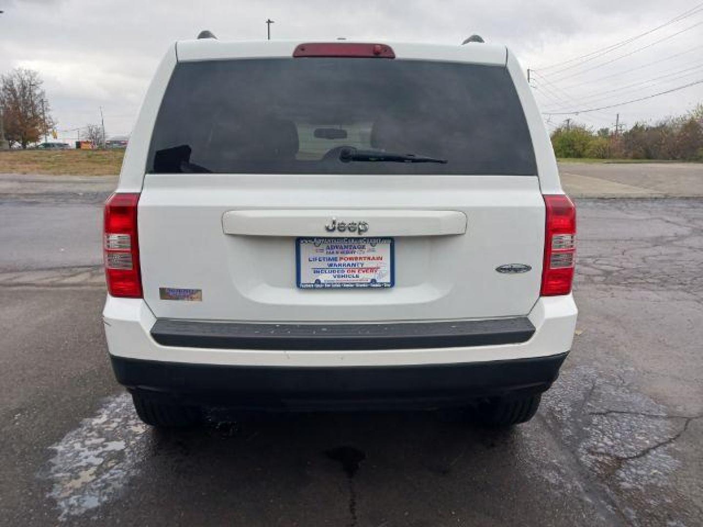 2015 Bright White Clearcoat Jeep Patriot Latitude 2WD (1C4NJPFA8FD) with an 2.0L L4 DOHC 16V engine, located at 880 E. National Road, Vandalia, OH, 45377, (937) 908-9800, 39.892189, -84.181015 - Photo#5