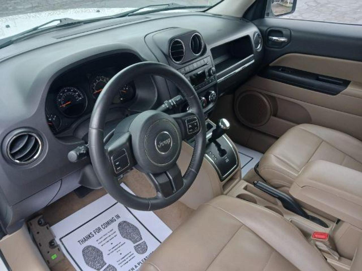 2015 Bright White Clearcoat Jeep Patriot Latitude 2WD (1C4NJPFA8FD) with an 2.0L L4 DOHC 16V engine, located at 880 E. National Road, Vandalia, OH, 45377, (937) 908-9800, 39.892189, -84.181015 - Photo#6