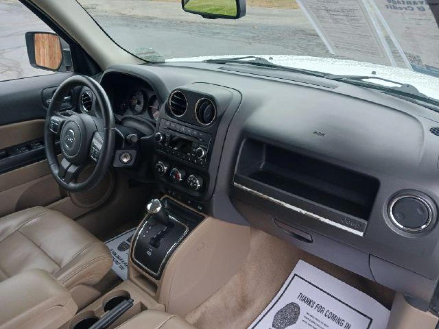 2015 Bright White Clearcoat Jeep Patriot Latitude 2WD (1C4NJPFA8FD) with an 2.0L L4 DOHC 16V engine, located at 880 E. National Road, Vandalia, OH, 45377, (937) 908-9800, 39.892189, -84.181015 - Photo#8