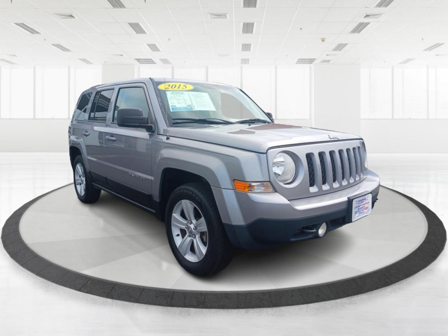 2015 Granite Crystal Met CC Jeep Patriot (1C4NJRBB3FD) with an 2.4L L4 DOHC 16V engine, located at 401 Woodman Dr, Riverside, OH, 45431, (937) 908-9800, 39.763779, -84.122063 - Photo#0