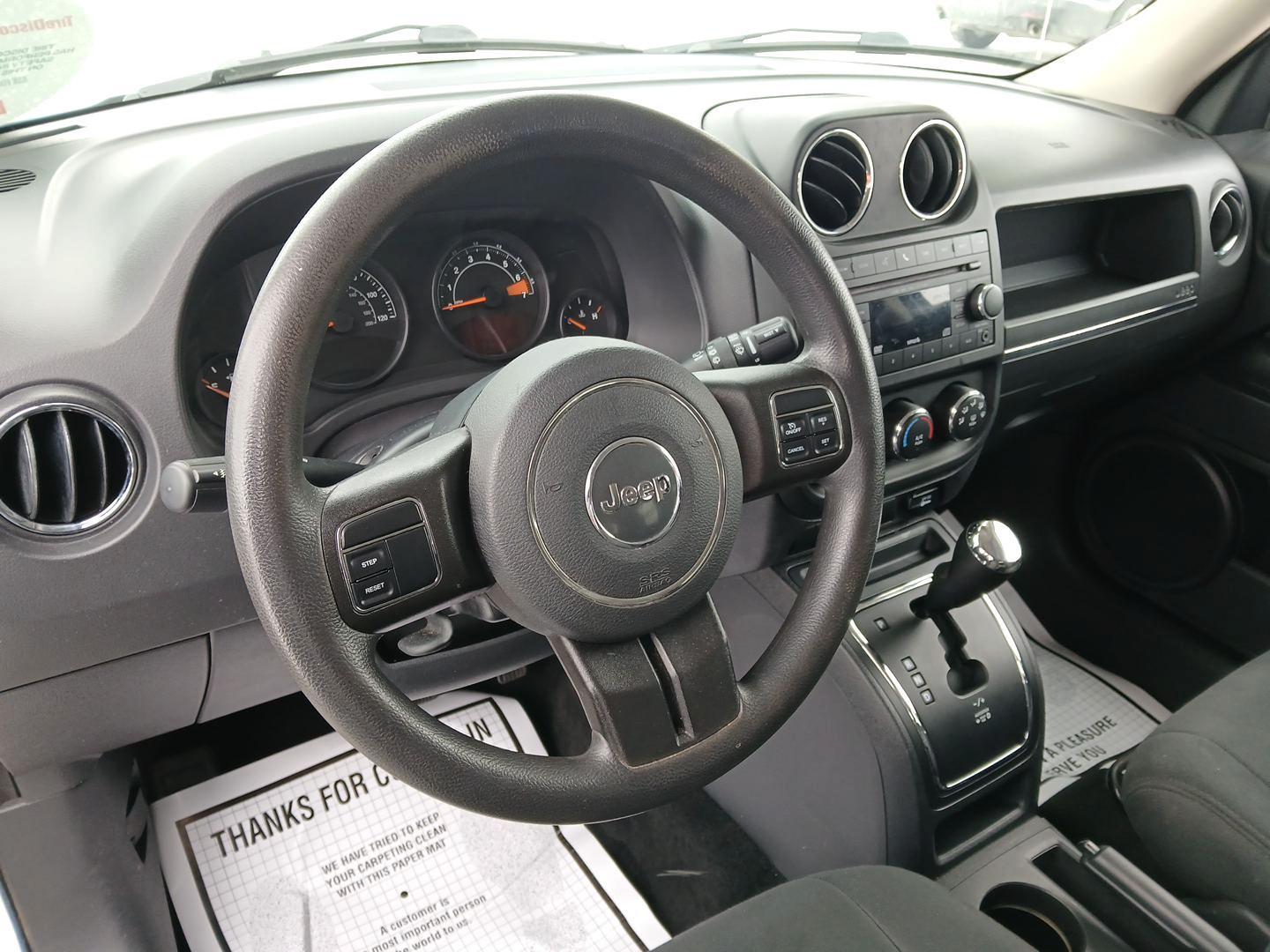 2015 Jeep Patriot Sport 4WD (1C4NJRBB7FD) with an 2.4L L4 DOHC 16V engine, located at 880 E. National Road, Vandalia, OH, 45377, (937) 908-9800, 39.891918, -84.183594 - 2015 Jeep Patriot Sport 4WD - Photo#8