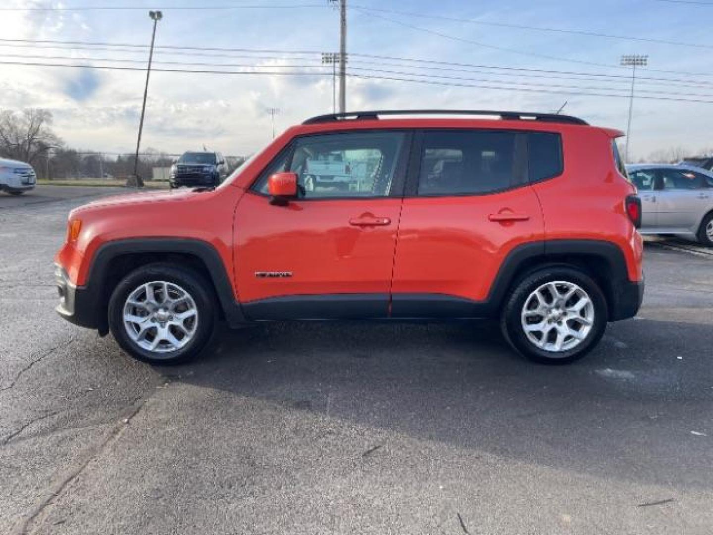 2015 Omaha Orange Jeep Renegade Latitude FWD (ZACCJABT6FP) with an 2.4L L4 DOHC 16V engine, 6-Speed Manual transmission, located at 1951 S Dayton Lakeview Rd., New Carlisle, OH, 45344, (937) 908-9800, 39.890999, -84.050255 - Photo#4