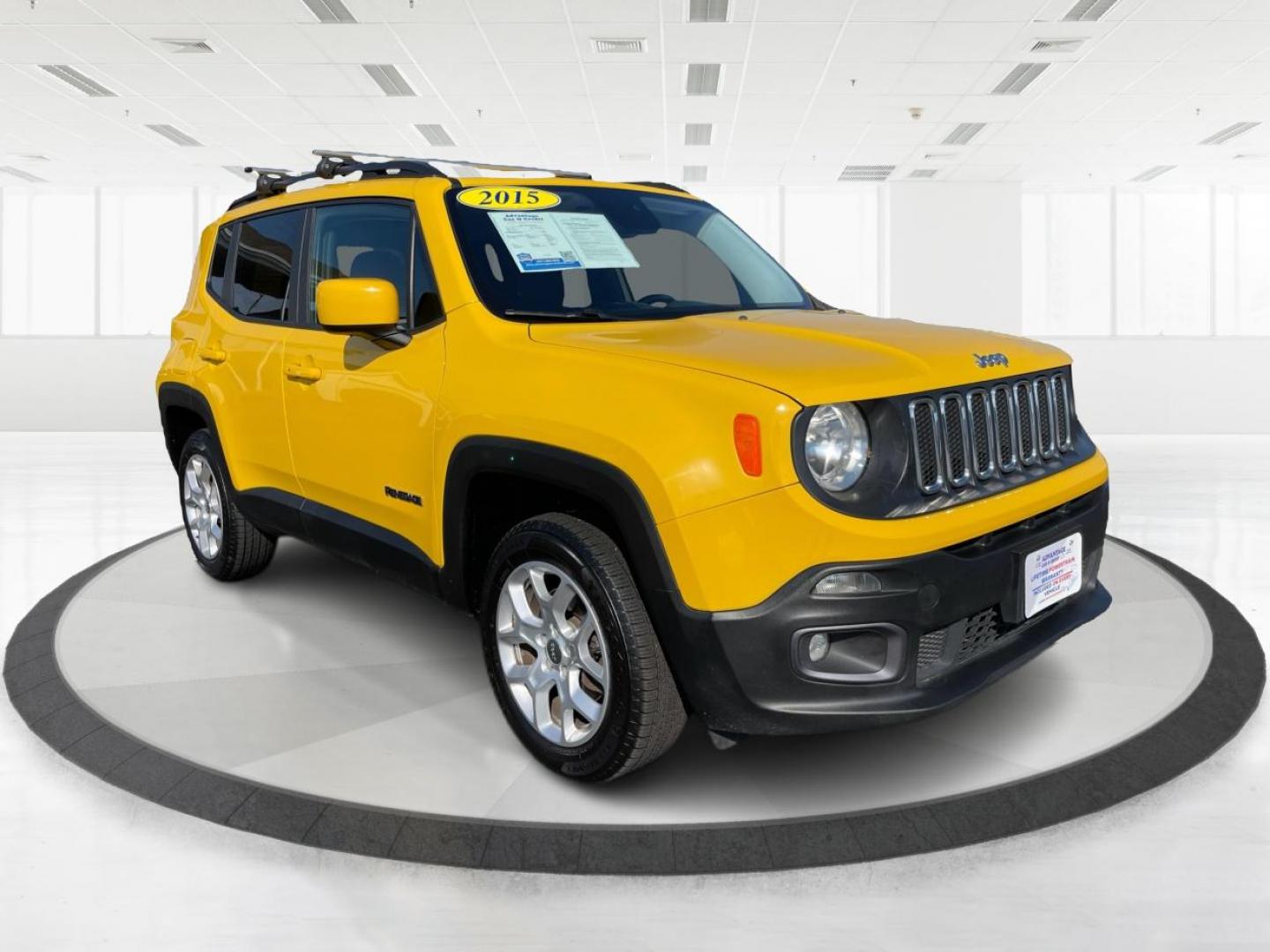 2015 Solar Yellow Jeep Renegade Latitude 4WD (ZACCJBBT3FP) with an 2.4L L4 engine, 6-Speed Manual transmission, located at 1951 S Dayton Lakeview Rd., New Carlisle, OH, 45344, (937) 908-9800, 39.890999, -84.050255 - Photo#0