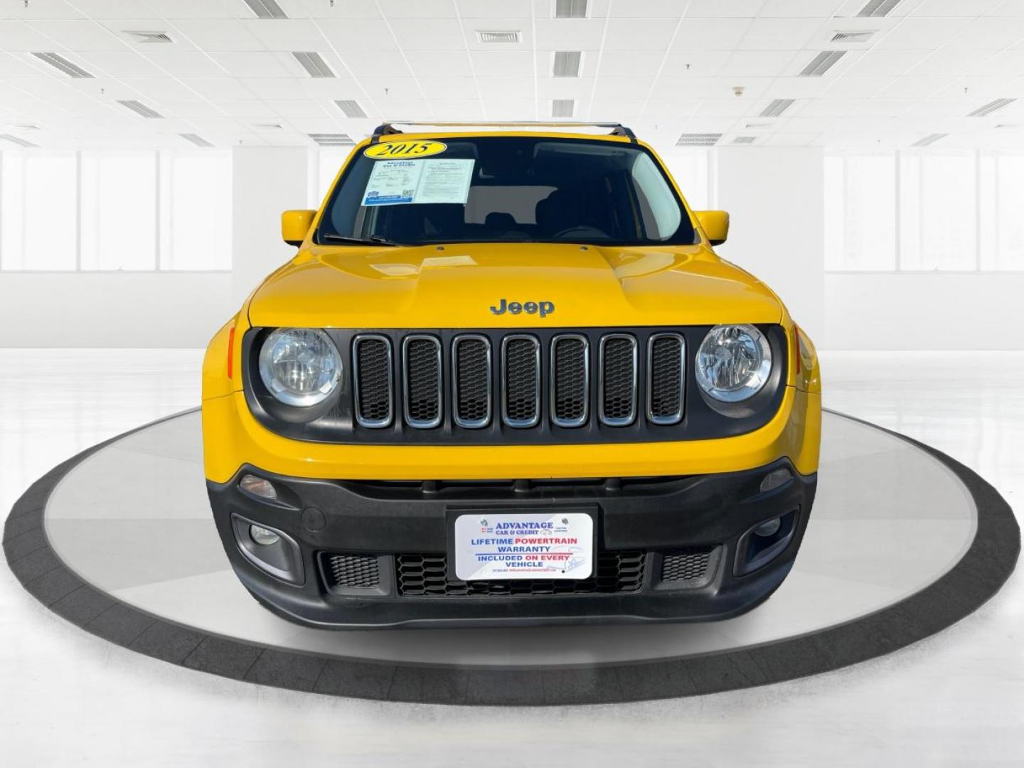 2015 Solar Yellow Jeep Renegade Latitude 4WD (ZACCJBBT3FP) with an 2.4L L4 engine, 6-Speed Manual transmission, located at 1951 S Dayton Lakeview Rd., New Carlisle, OH, 45344, (937) 908-9800, 39.890999, -84.050255 - Photo#6