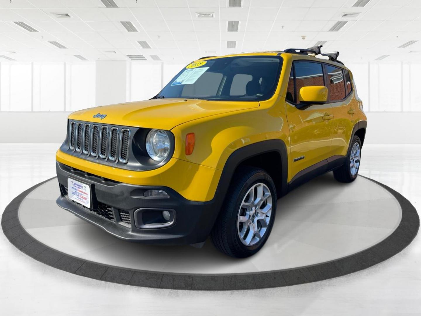 2015 Solar Yellow Jeep Renegade Latitude 4WD (ZACCJBBT3FP) with an 2.4L L4 engine, 6-Speed Manual transmission, located at 1951 S Dayton Lakeview Rd., New Carlisle, OH, 45344, (937) 908-9800, 39.890999, -84.050255 - Photo#7