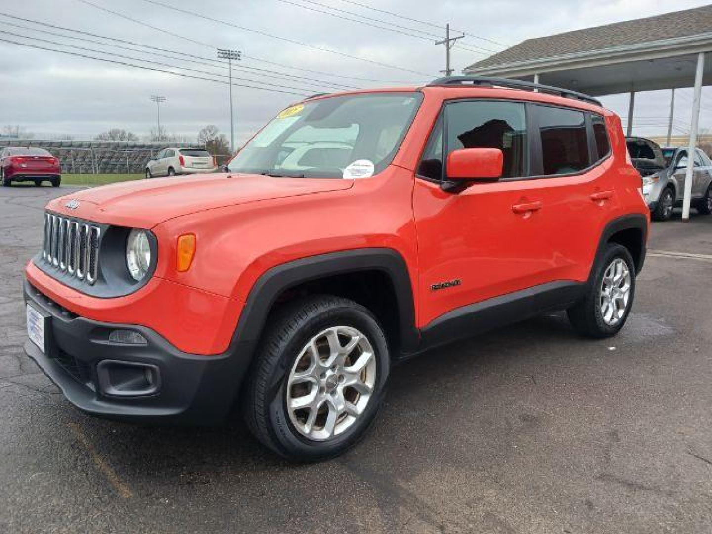 2015 Omaha Orange Jeep Renegade Latitude 4WD (ZACCJBBT1FP) with an 2.4L L4 DOHC 16V engine, 6-Speed Manual transmission, located at 401 Woodman Dr, Riverside, OH, 45431, (937) 908-9800, 39.763779, -84.122063 - Photo#2