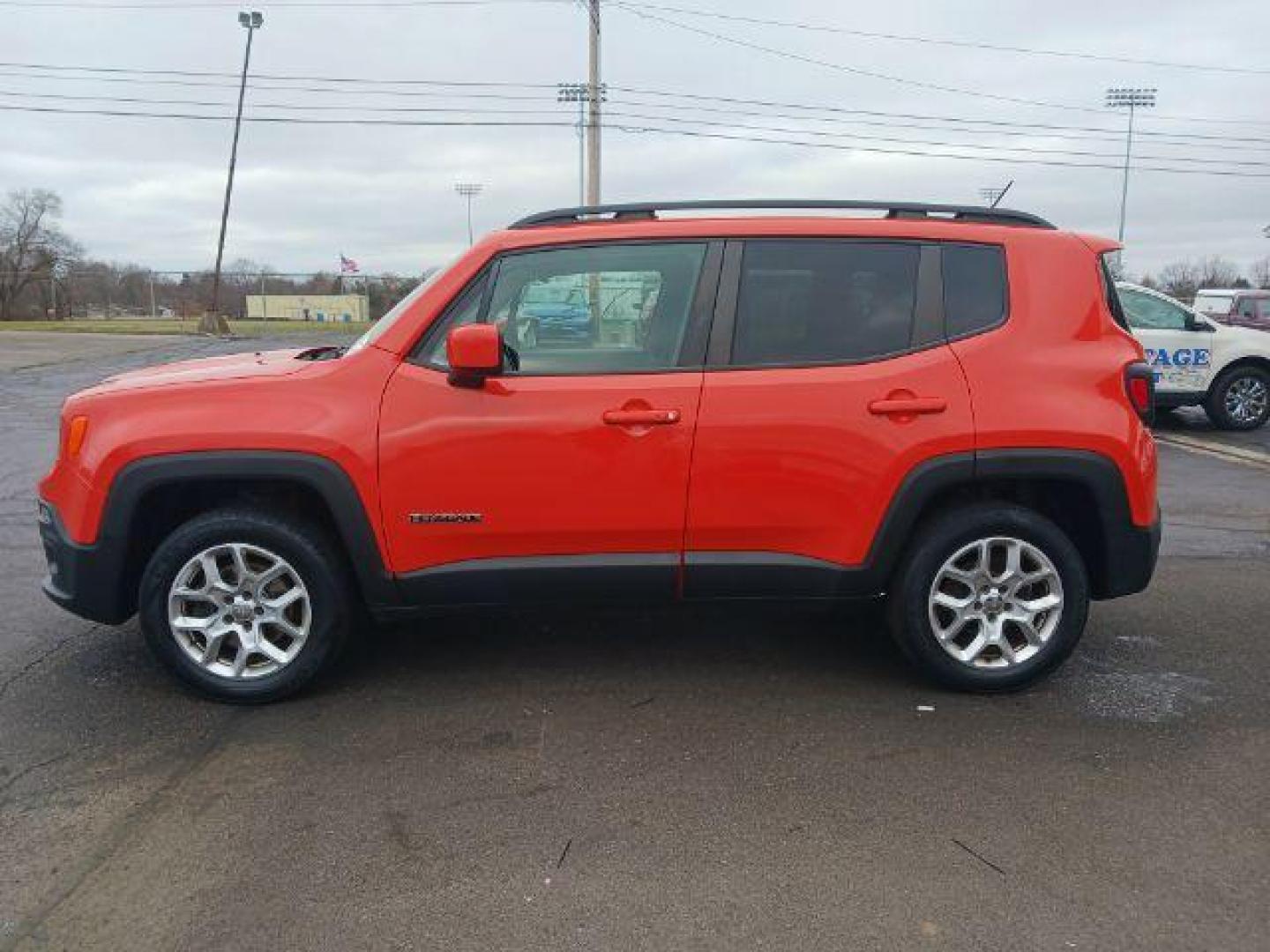 2015 Omaha Orange Jeep Renegade Latitude 4WD (ZACCJBBT1FP) with an 2.4L L4 DOHC 16V engine, 6-Speed Manual transmission, located at 401 Woodman Dr, Riverside, OH, 45431, (937) 908-9800, 39.763779, -84.122063 - Photo#3