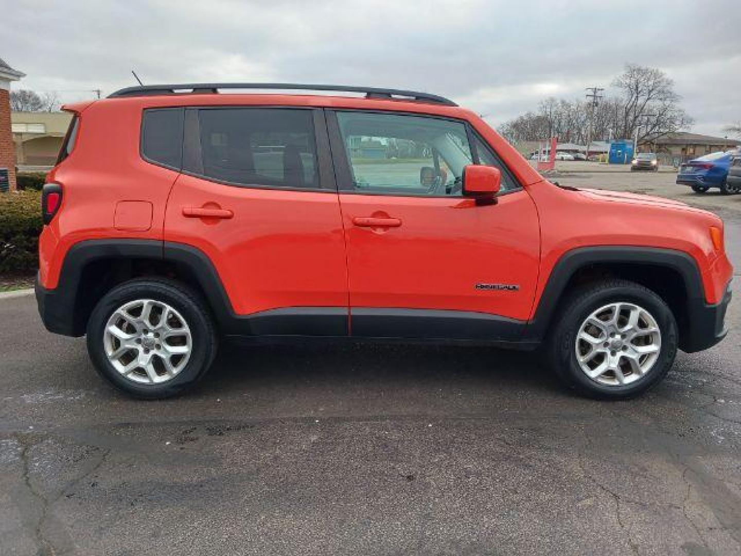 2015 Omaha Orange Jeep Renegade Latitude 4WD (ZACCJBBT1FP) with an 2.4L L4 DOHC 16V engine, 6-Speed Manual transmission, located at 401 Woodman Dr, Riverside, OH, 45431, (937) 908-9800, 39.763779, -84.122063 - Photo#4