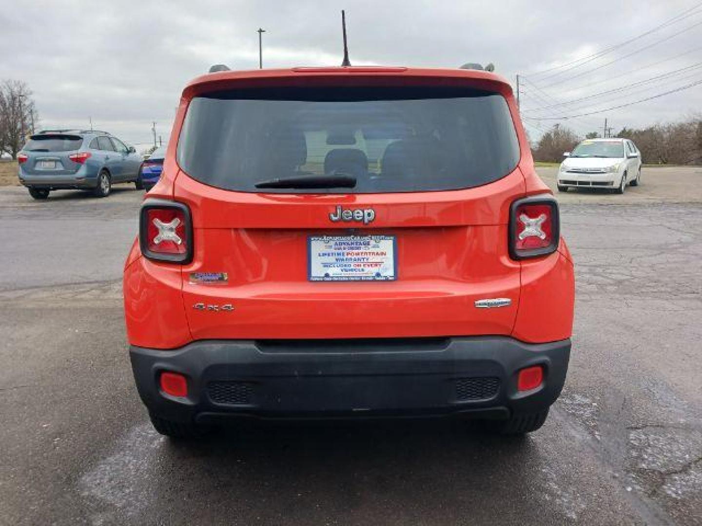 2015 Omaha Orange Jeep Renegade Latitude 4WD (ZACCJBBT1FP) with an 2.4L L4 DOHC 16V engine, 6-Speed Manual transmission, located at 401 Woodman Dr, Riverside, OH, 45431, (937) 908-9800, 39.763779, -84.122063 - Photo#5