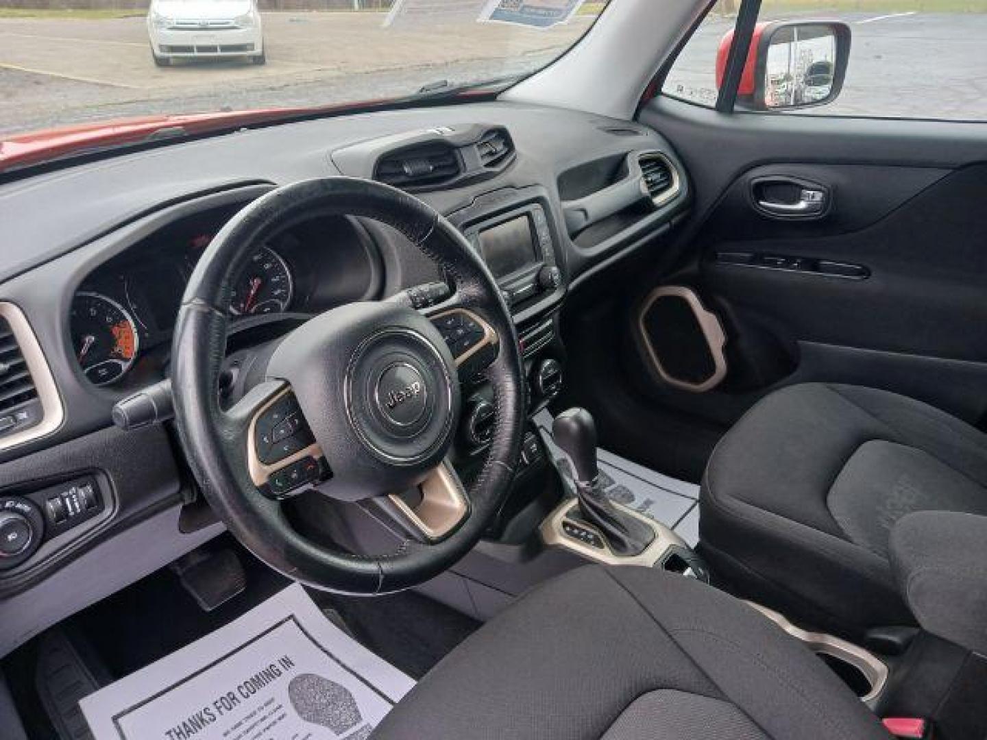 2015 Omaha Orange Jeep Renegade Latitude 4WD (ZACCJBBT1FP) with an 2.4L L4 DOHC 16V engine, 6-Speed Manual transmission, located at 401 Woodman Dr, Riverside, OH, 45431, (937) 908-9800, 39.763779, -84.122063 - Photo#6